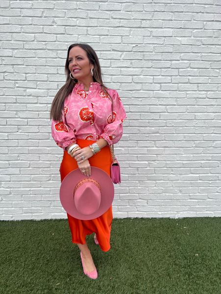 Pink and orange are one of my favorite color combinations so this top from Never a Wallflower is perfect for me. 🩷🧡

#LTKover40 #LTKworkwear #LTKstyletip
