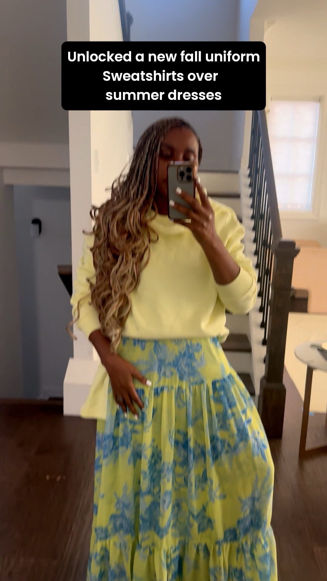 Who knew Sweatshirts over a maxi dress would hit. The key is complementary colors/prints.

My maxi is old but you can absolutely do this with items already in your closet. Sweatshirt is available, wearing a medium. 