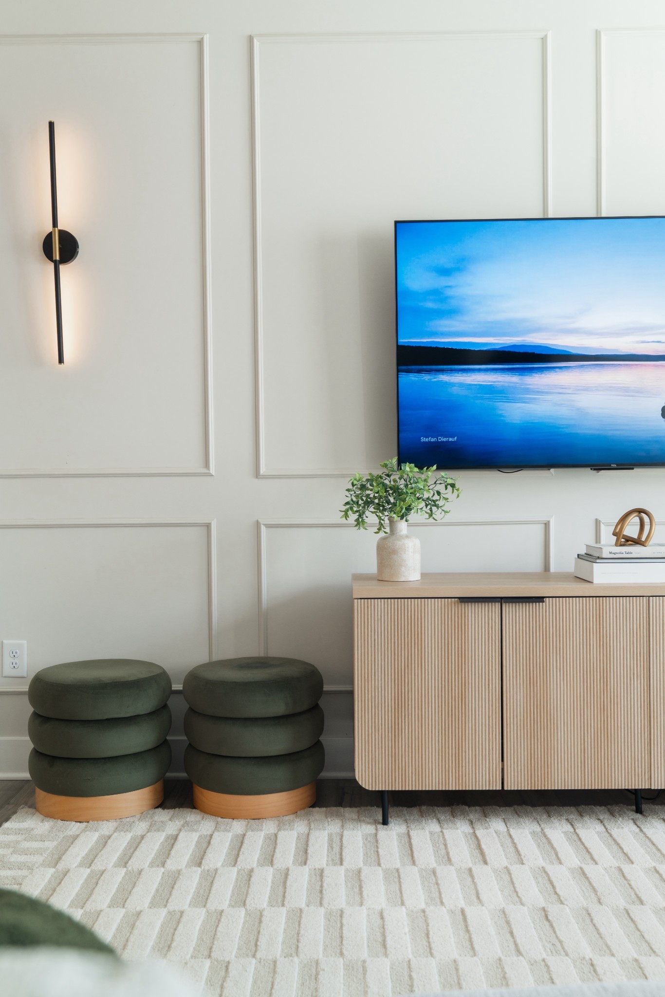 Personalizing your home is so important. When we first moved into our new, builder-grade home, this was a blank slate. Very little character. Adding wall molding and scones lighting helped to warm up the space. 

#LTKHome