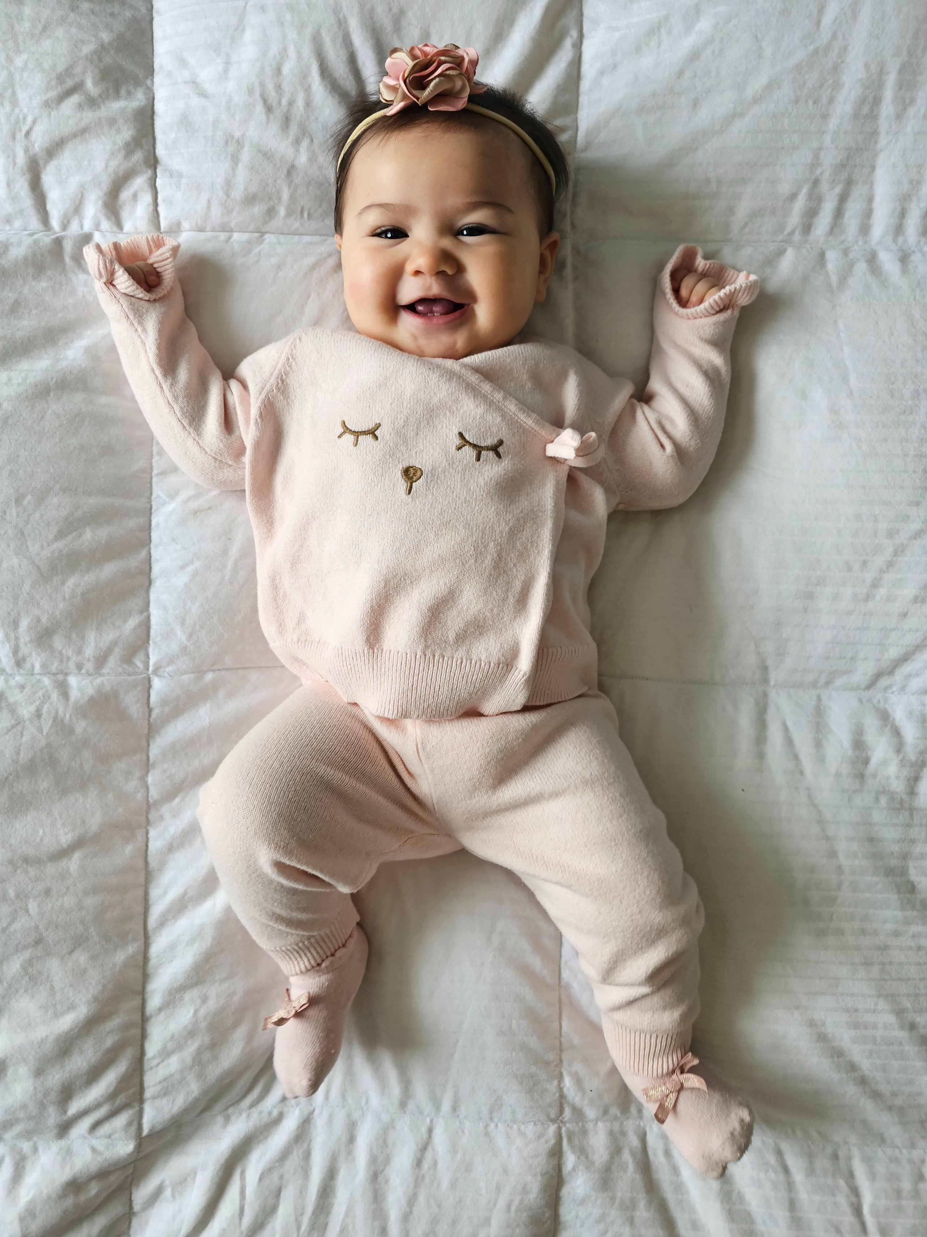 Knit top and joggers set, ruffled floral head band, pink bow socks, sleeping face embroidery, bell ruffled sleeves

#LTKgrwm #LTKootd #LTKBaby