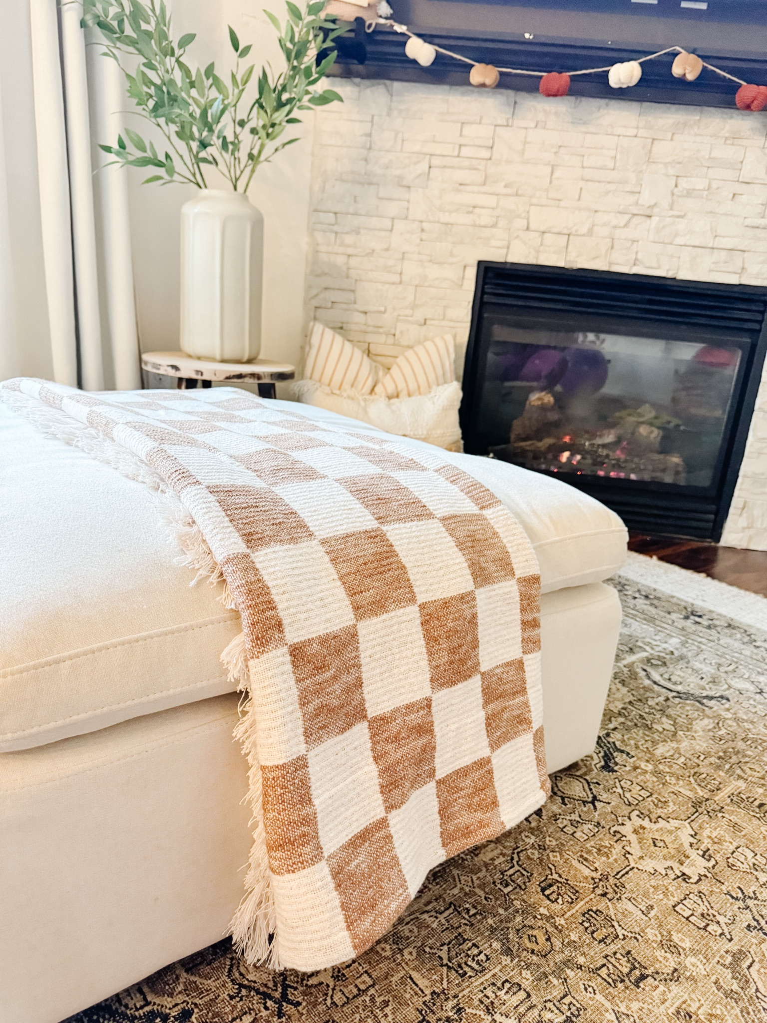 Target checkered throw, obsessed! #targetfinds #targethome #neutralthrow

#LTKstyletip #LTKhome #LTKSeasonal