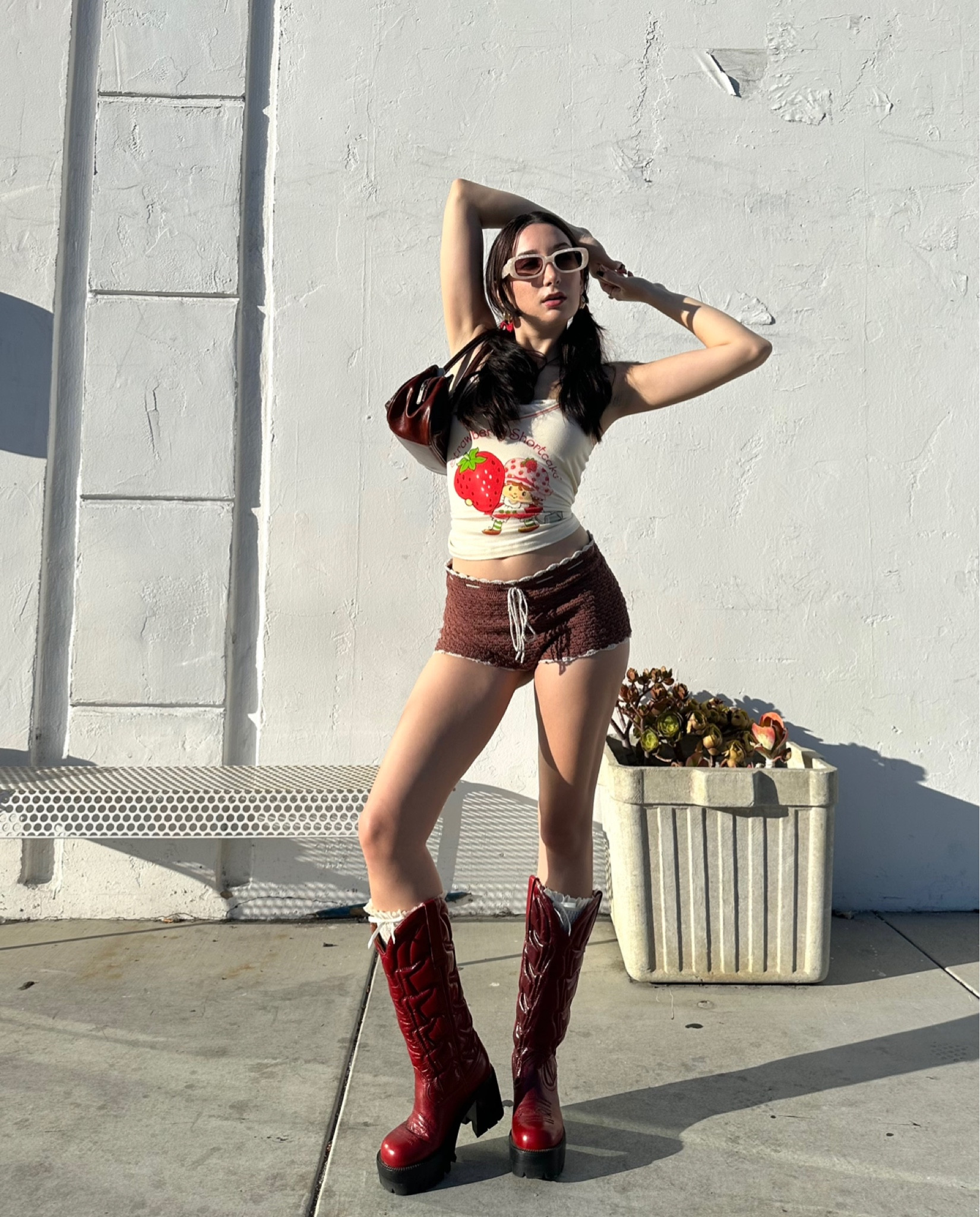 Strawberry girl. Og brands:

top - strawberry shortcake
shorts - xirena 
boots - jeffrey campbell
bag - rina rich