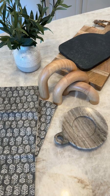 I picked up a few decor pieces that can work all year round! Like this stone candle tray, vintage pillow covers (I’ll link my favorite inserts too!), this simple faux olive plant, a wood cutting board as well as a dark marble cutting board, and finally these set of three wooden arches! They pair perfectly with some coffee table books! 

#LTKVideo #LTKHome #LTKSaleAlert