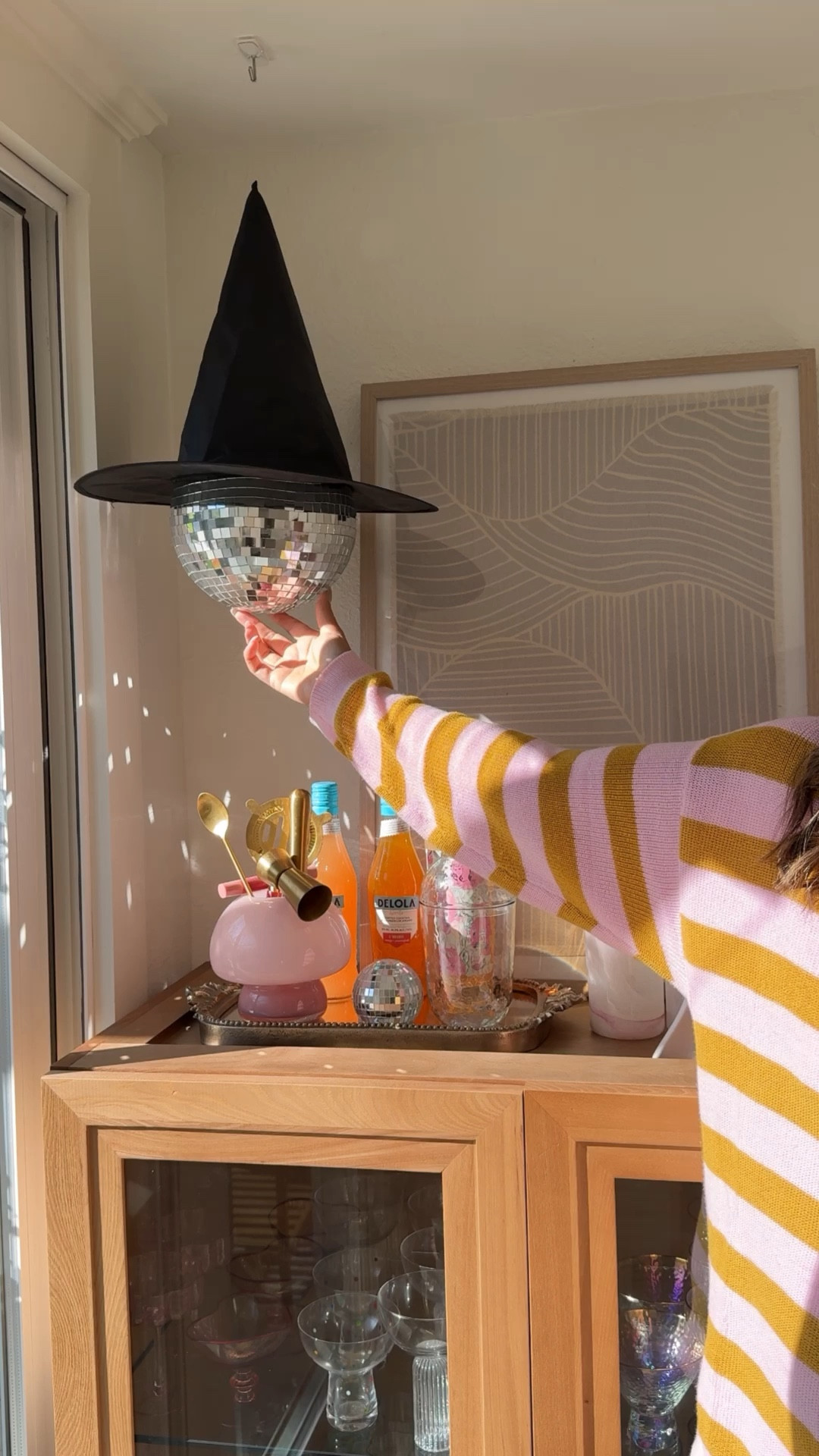 Hanging disco ball witches 

#LTKVideo #LTKSeasonal #LTKHome