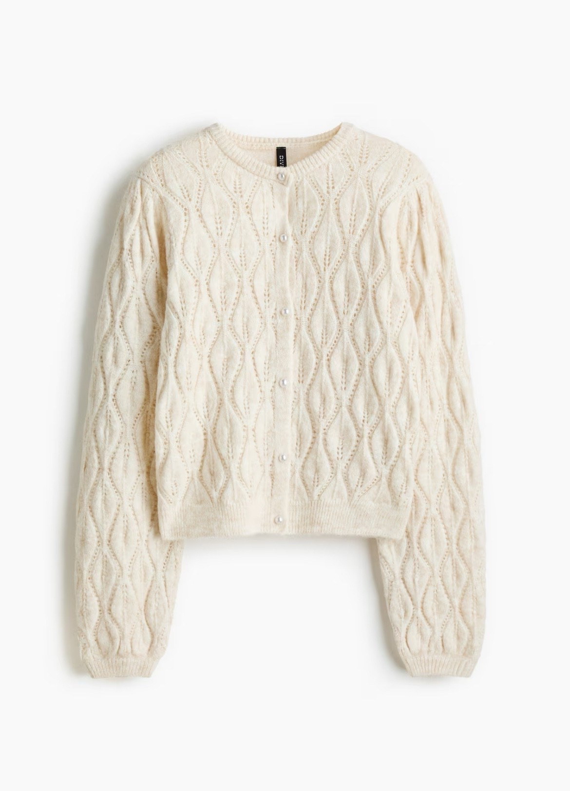 Cream pearl button cardigan 

#LTKSeasonal #LTKFindsUnder50