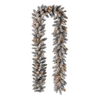 Glitzhome® 9ft. LED Snow Flocked Christmas Garland | Michaels Stores