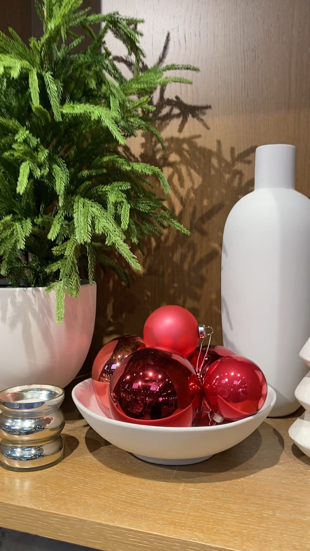 West Elm Christmas decor. Red tonal Christmas ornaments; Organic Shaped Porcelain 11" Large Serving Bowl; Faux Glittered Pine Tree w/ Terracotta Planter; Modern Mercury Glass Candle Holder; Foundations Whitewash Vases; New
Shape Studies Tabletop Trees

#LTKmens #LTKhome #LTKHoliday