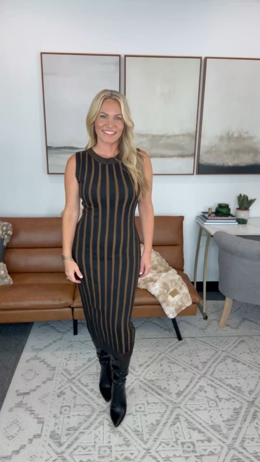 I had a day full of meetings and wanted something that looked professional without sacrificing comfort. This knit dress has plenty of stretch, but the heavier fabric keeps everything smooth instead of clinging. The vertical stripe is flattering, the midi length pairs perfectly with tall boots, and I never felt like I needed to adjust it throughout the day.

Striped knit dress, sweater knit dress, sleeveless midi dress, fall work outfit, office outfit, tall black boots, business casual style, fall fashion, boutique style, AudrieDollins

#LTKootd #LTKWorkwear #LTKSeasonal
