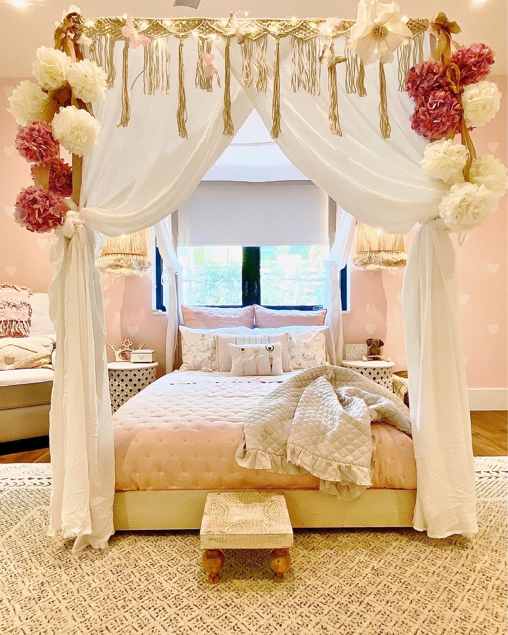 For this little girl’s room I layered shades of pink , florals, and lots of frills & textures on the bedding to create a whimsical room fit for a little princess. Also added a plush rug and super feminine wall paper and pendant lights! 

#LTKhome #LTKfamily #LTKSale