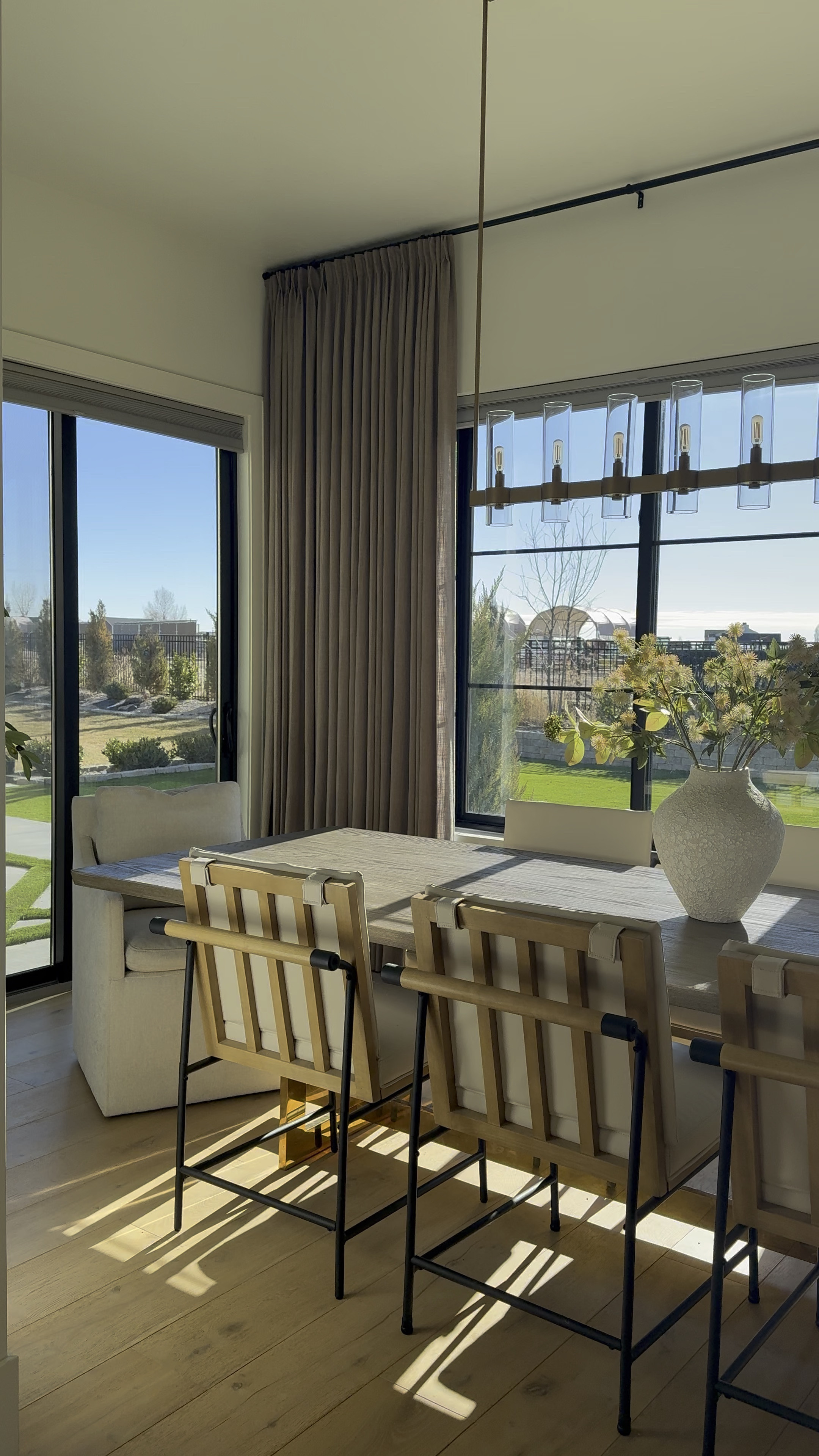 Shop this dining room moment . 
Two pages custom drapes 
Studio McGee lookalike chairs 
Linen upholstered chairs 
RH dining table 
RH inspired linear chandelier .

#LTKHome #LTKStyleTip #LTKMostLoved