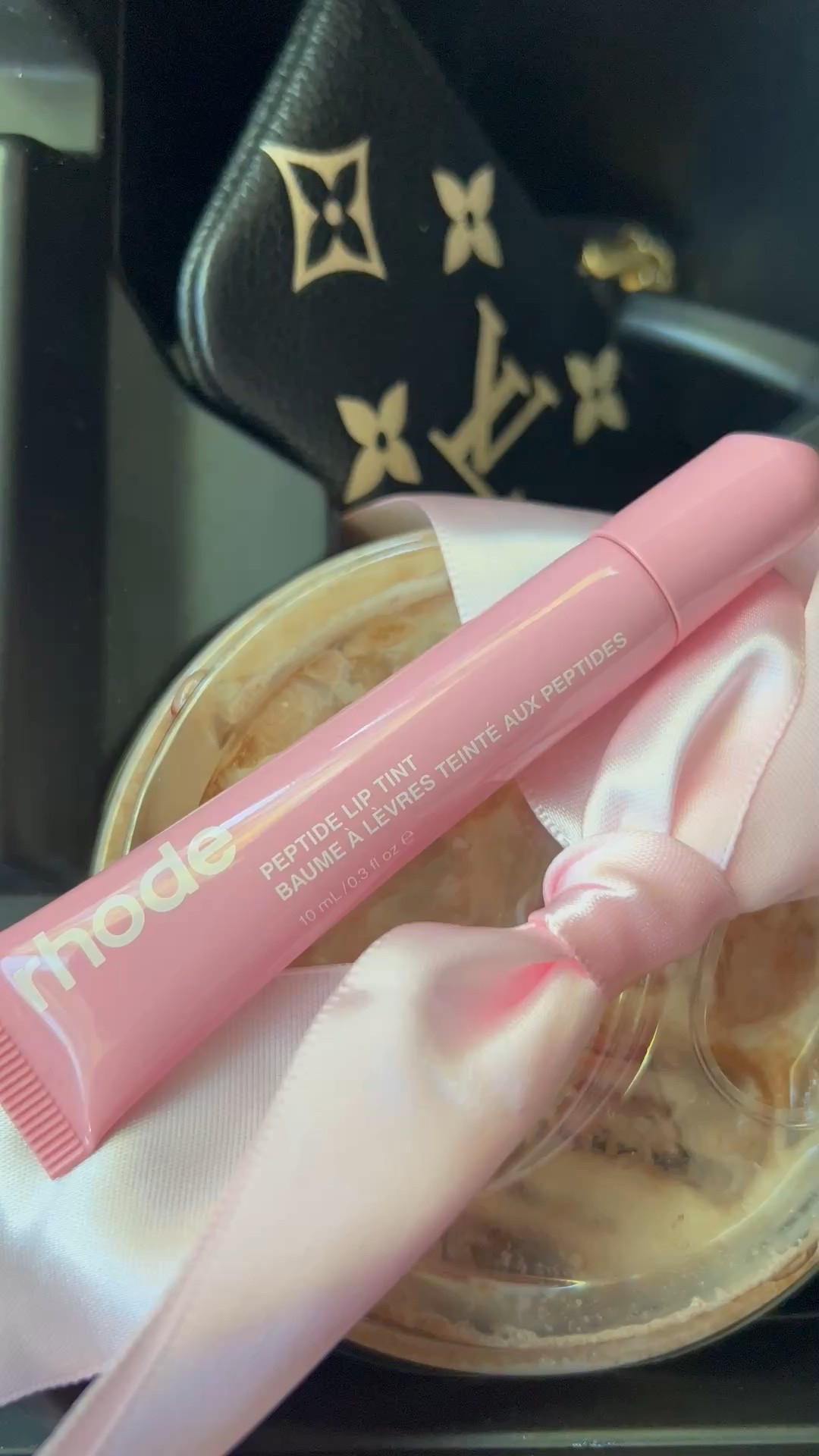 Rhode peptide lip tint in ribbon
Lippie
Louis Vuitton Monogram pouch 
Gifts for her 

#LTKdayinmylife #LTKBeauty #LTKGiftGuide