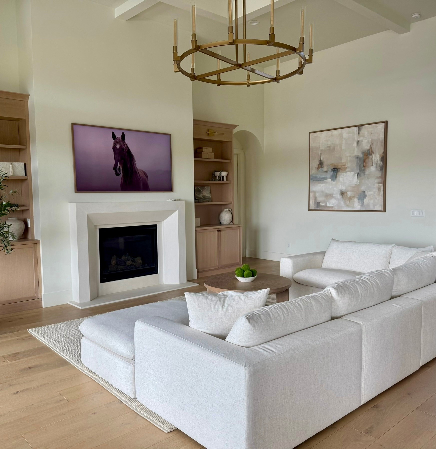 I love this neutral living room setup, especially the soft sectional, round wood coffee table, and warm brass chandelier. These are the kinds of pieces I reach for when I want a space to feel calm, open, and comfortable while still looking elevated.

I like layering simple textures like a neutral area rug, light upholstery, and warm wood tones to create a living room that feels relaxed but thoughtfully designed. These pieces work beautifully together and are easy to build a timeless space around. I’ve linked the ones I use below.
@Wayfair 
@Amazon
@walmart

#LTKHome #LTKSaleAlert #LTKU