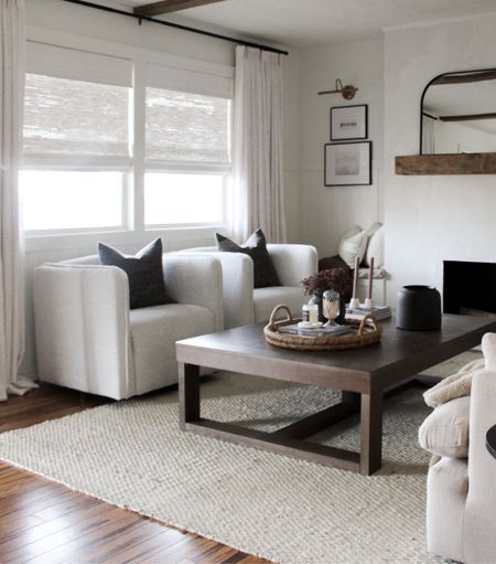 Living room new boucle accent chairs 

living room. Furniture. Boucle accent chairs. Accent chair. Wood coffee table jute rug. Neutral home decor. Organic modern. Woven tray. Arch mirror. Mantel mirror. Linen curtains. 

#LTKunder100 #LTKFind #LTKhome