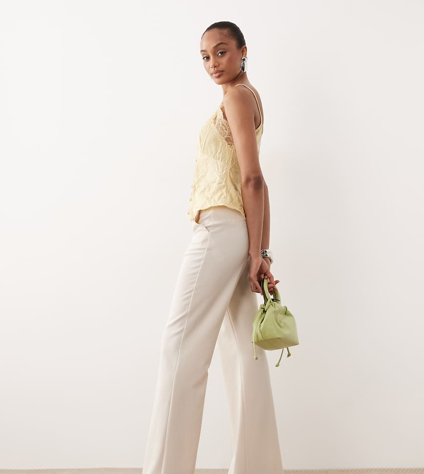 ASOS DESIGN Tall tailored snatch flare trousers in cream-White | ASOS (Global)