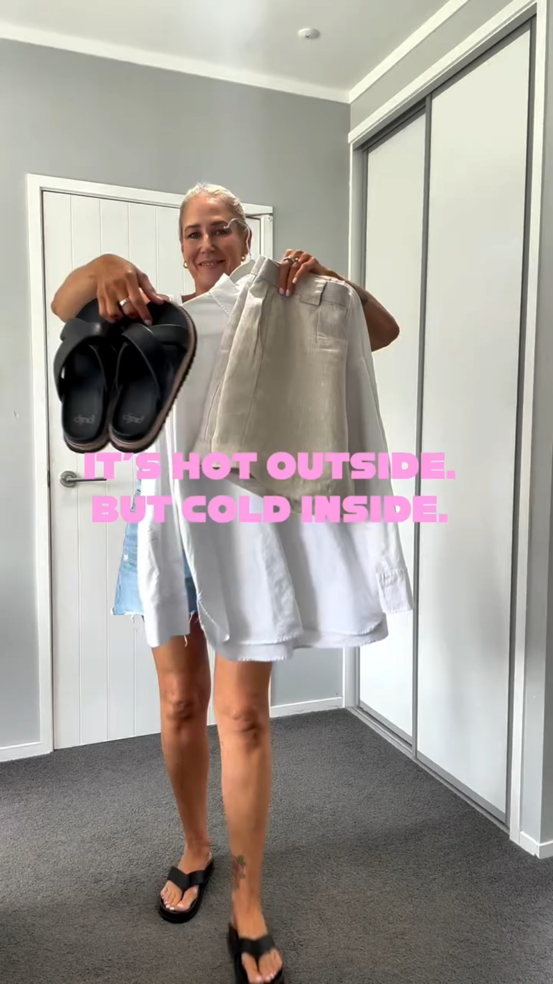 Peak summer office dressing. 
🔥Hot outside, ❄️cold inside. An oversized oxford shirt worn as a jacket makes it work.

Would you wear this to work?

@dissh linen shorts
@featherandnoise Millie tank
@kmart.nz oxford shirt
@glassons belt
@numberoneshoesandhannahs slides
*contains some previously gifted items 

#SummerWorkwear
#OfficeStyle
#ModernWorkwear
#WorkwearInspo
#styleover40