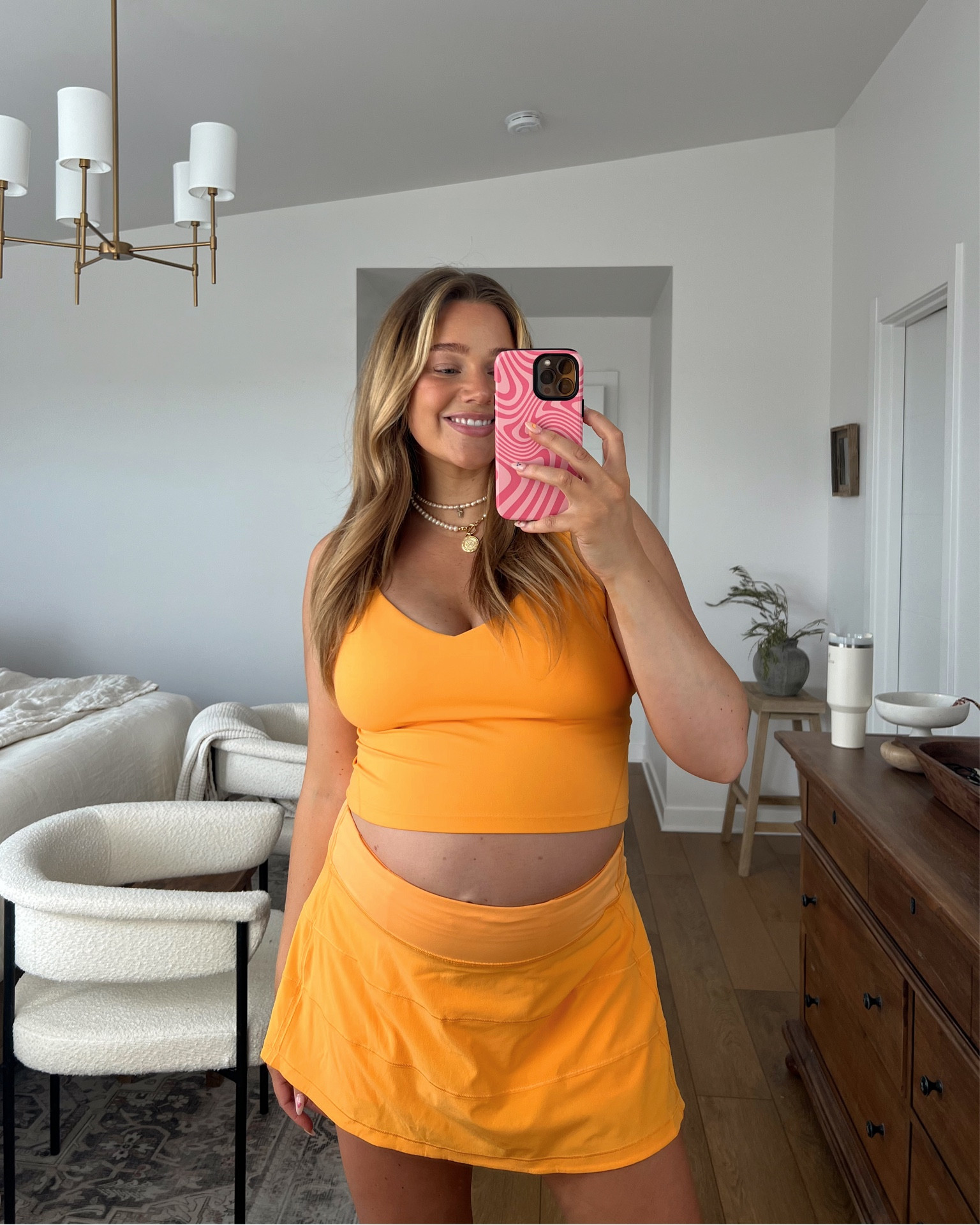 lululemon Pace Rival Skirt has built in shorts, front cinch, pack zip pocket (tts but went up to a 12 in pregnancy) + Align tank (size up in this one also!!) BRE20 for $$ off electric picks jewelry  

#LTKbump #LTKFitness