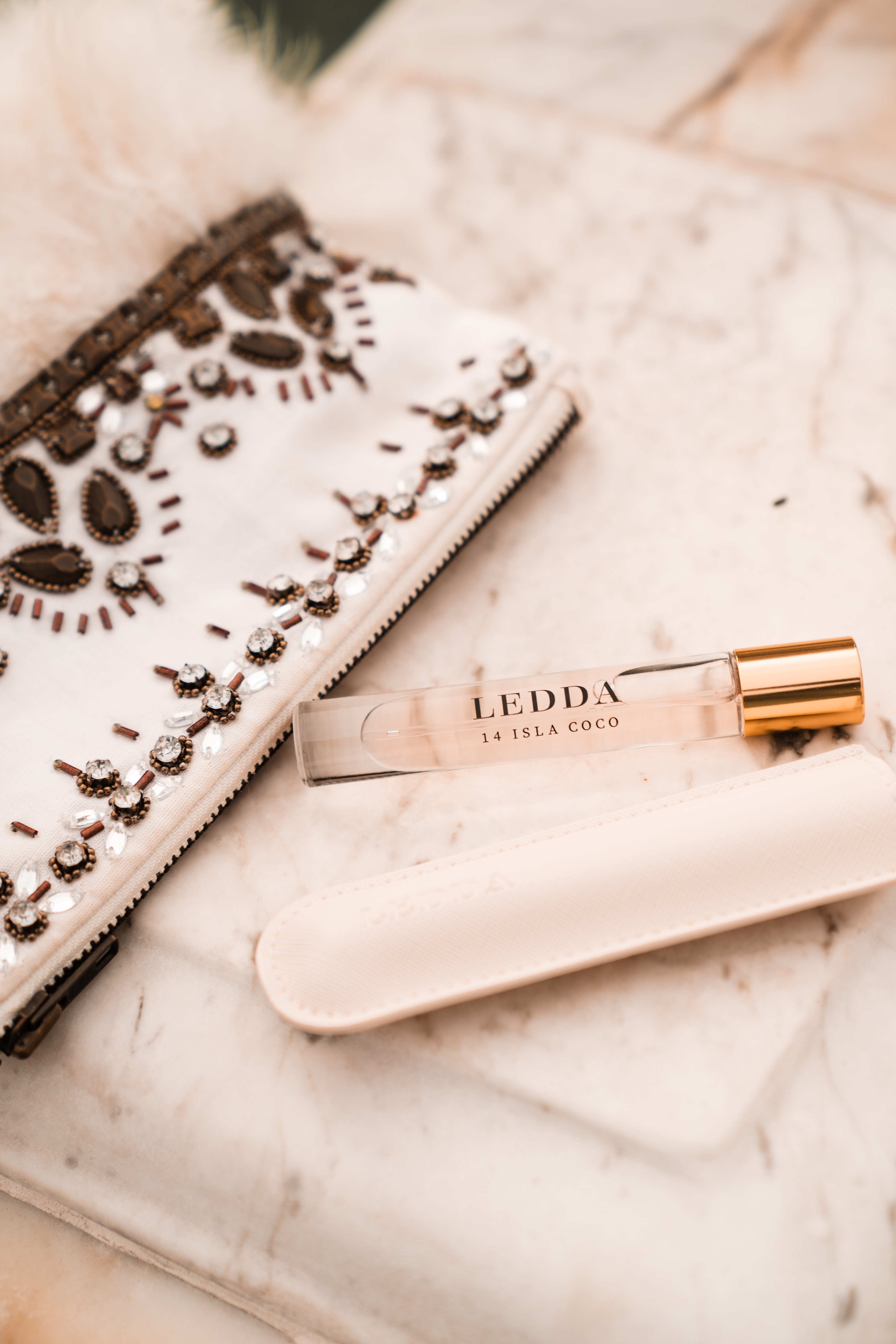 Transport yourself to a tropical paradise with @leddafragrance's 14 Isla Coco travel size 🌺✨. This sweet, intoxicating scent combines fresh citrus, jasmine, and ylang ylang for a sun-kissed, uplifting aroma. With notes of lemon, mandarin, and calamansi, plus fig leaf, cedarwood, and creamy coconut milk, it's the perfect way to elevate your everyday and enhance your spring and summer mood.

A debossed faux leather case is included to keep your 14 Isla Coco safe on all your adventures.

#perfume #ad #Leddafragrance #22Orris #LuxuryPerfume #FragranceLovers #ScentOfElegance #ltkbeauty #ltktravel 

#LTKBeauty