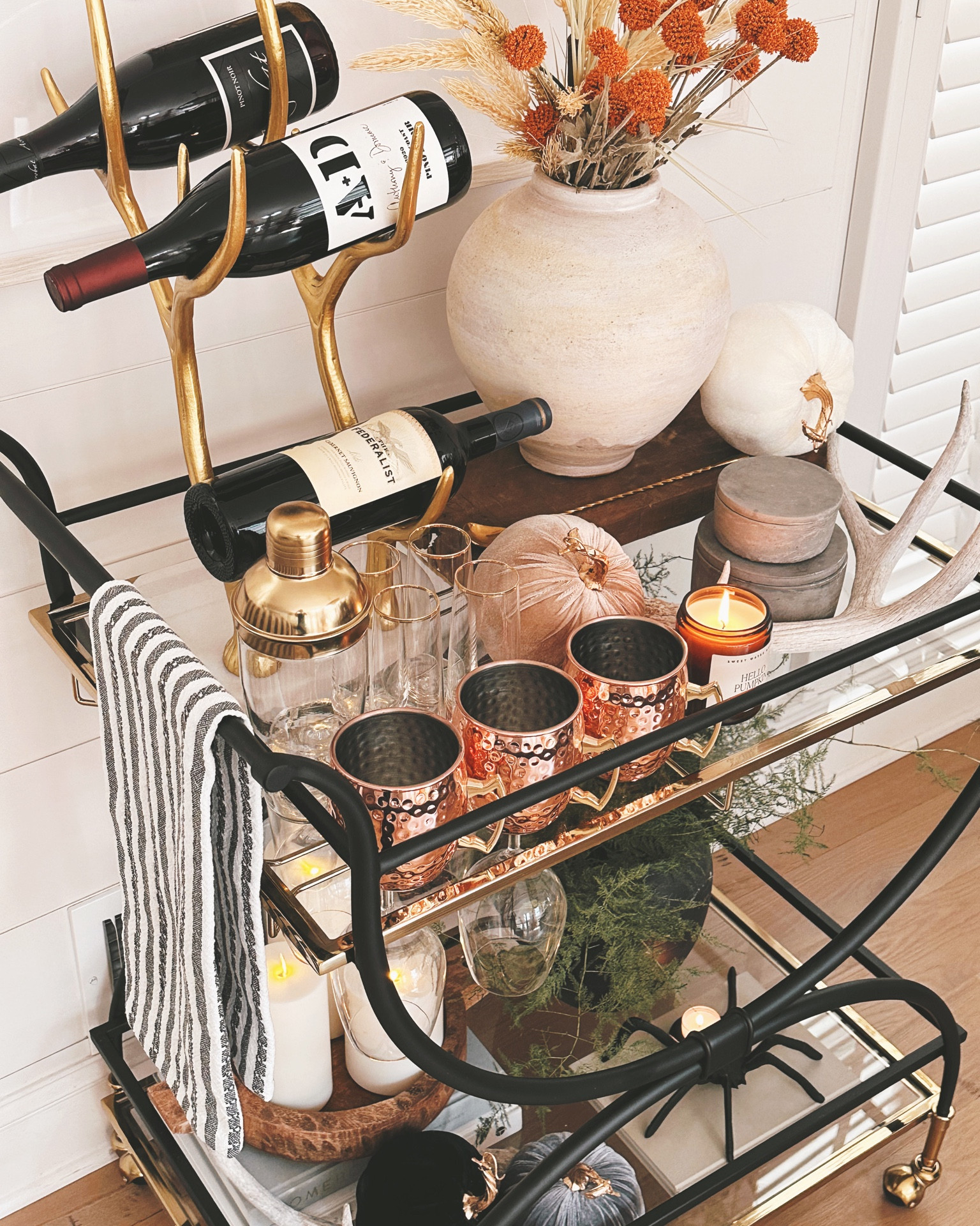 Fall Entertaining with Frontgate styled bar cart and wine bottle holder home decor  #frontgate #fall #barcart #wine #candles #fallhome

#LTKstyletip #LTKhome