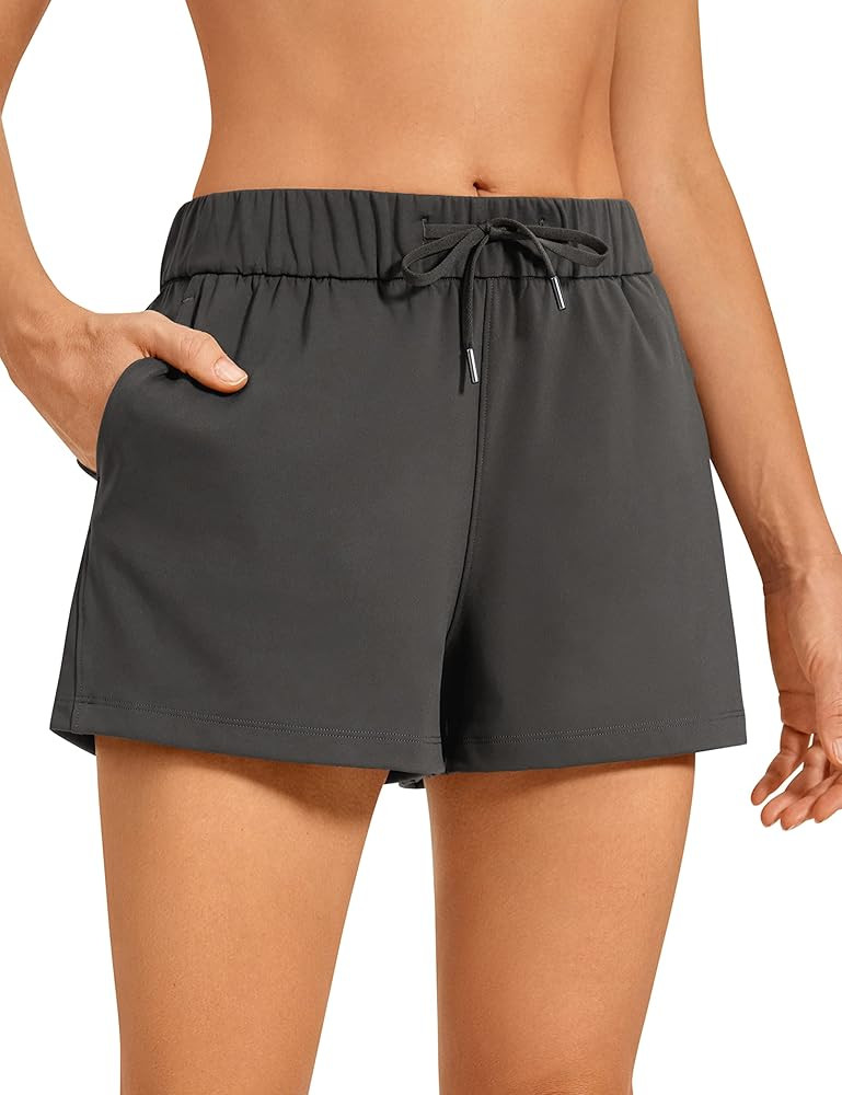 CRZ YOGA Stretch Shorts for Women Work Casual 2.5'' - Athletic Shorts with Pockets for Workout Tr... | Amazon (US)