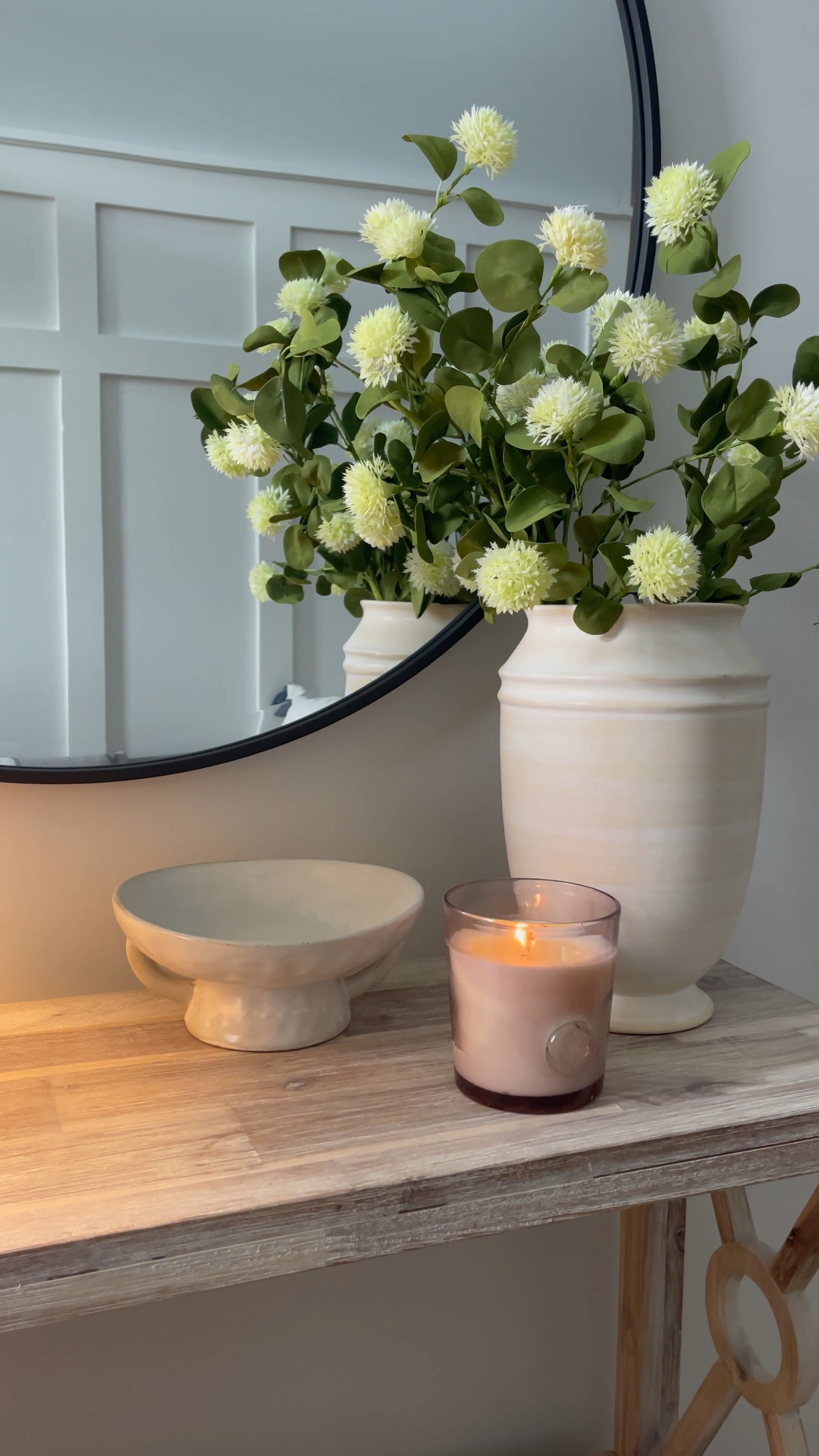 Entryway decor; decorative vase, candle, round mirror. 

#LTKhome #LTKstyletip