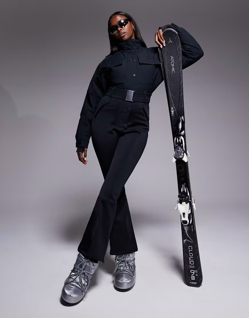 ASOS 4505 Ski funnel neck kick flare belted ski suit in black | ASOS (Global)