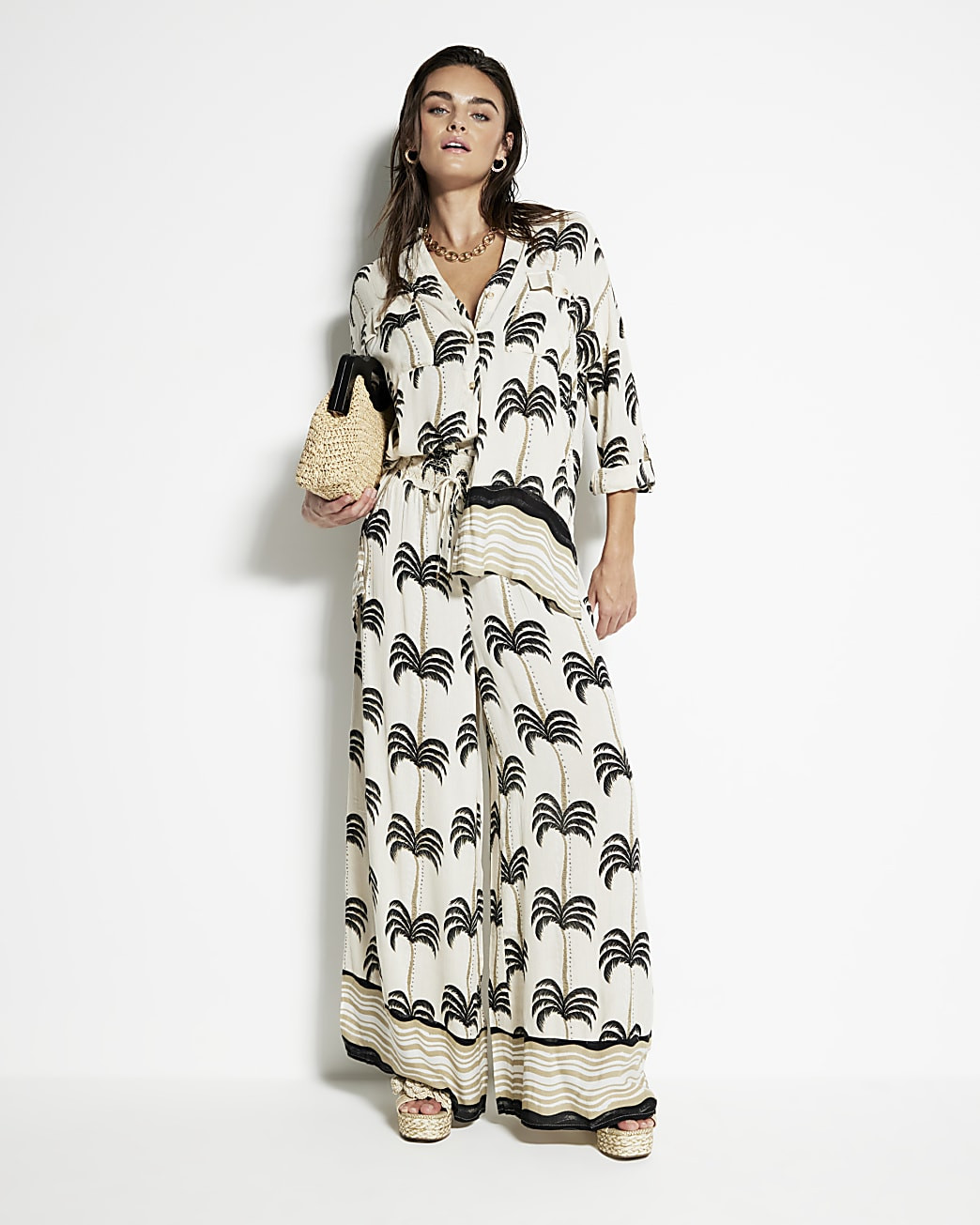 Cream Palm Print Wide Leg Beach Trousers | River Island UK & IE