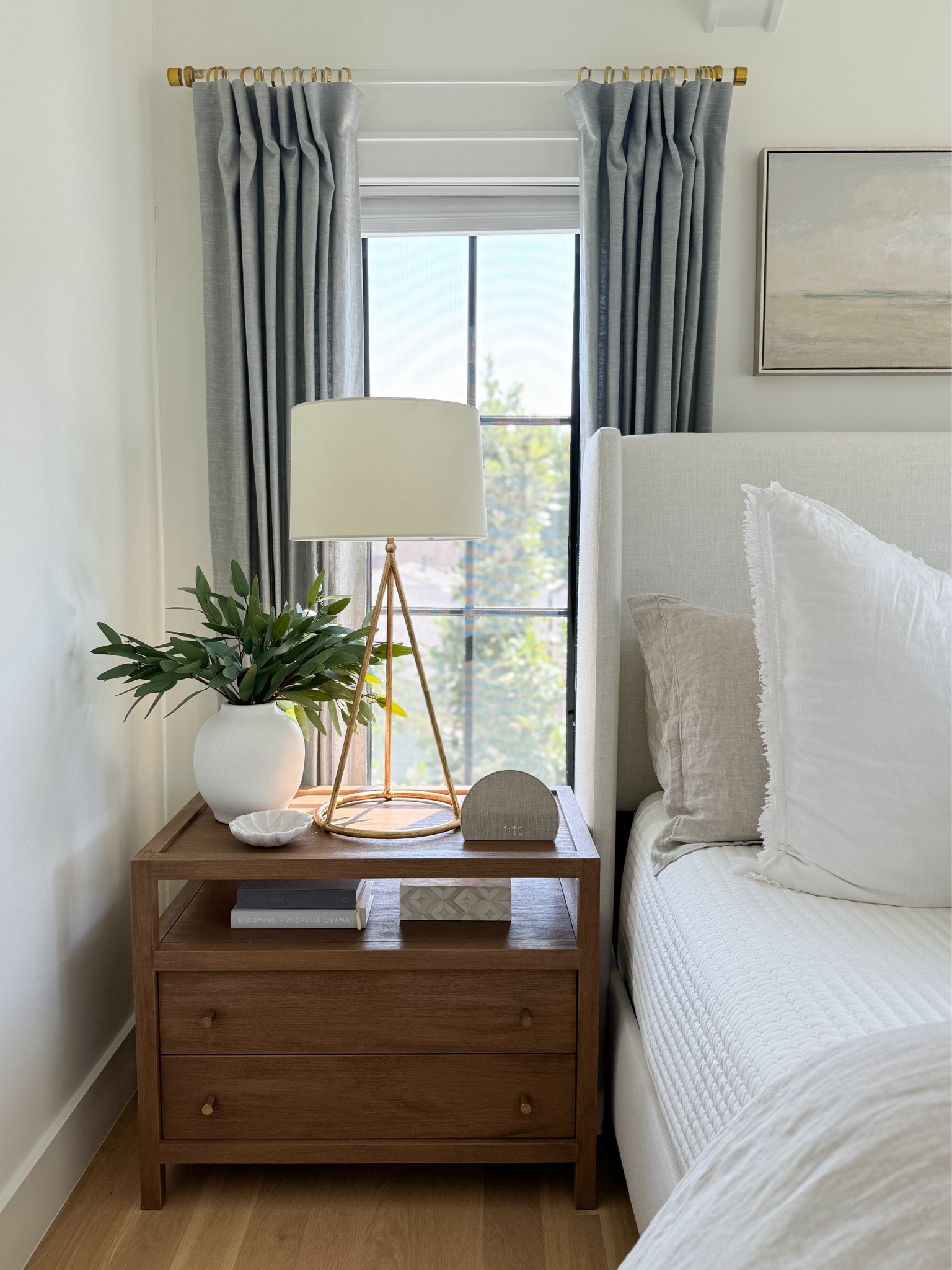 Our 2 drawer nightstands are our favorite! The top drawer has a built in charging strip which make it easy to charge devices out of site. Faux eucalyptus stems are from Amazon! Curtains are the mineral blue color with light filtering lining 

#LTKFindsUnder50 #LTKStyleTip #LTKSaleAlert