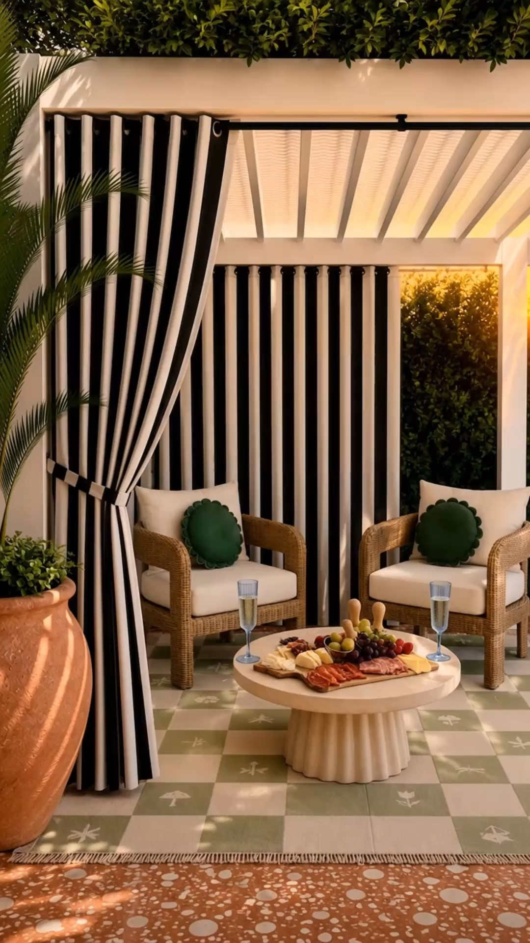 Golden hour just hits different. 🥂✨

As the sun dips lower, this little patio transforms into the perfect spot to slow down. A charcuterie board, chilled champagne, soft golden light, and classic black-and-white striped Sunbrella curtains create that effortless resort feeling—without ever leaving home.

It’s proof that the best summer evenings don’t need much—just beautiful outdoor furniture, a cozy setup, and someone to share it with.

#LTKHome #LTKOutdoor #PatioInspiration #BackyardDesign #OutdoorLiving #CocktailHour #GoldenHour #OutdoorDecor #CoastalStyle #ModernClassic #BackyardIdeas #ResortStyle #OutdoorFurniture #Sunbrella #SummerEntertaining

#LTKdayinmylife #LTKHome #LTKSaleAlert