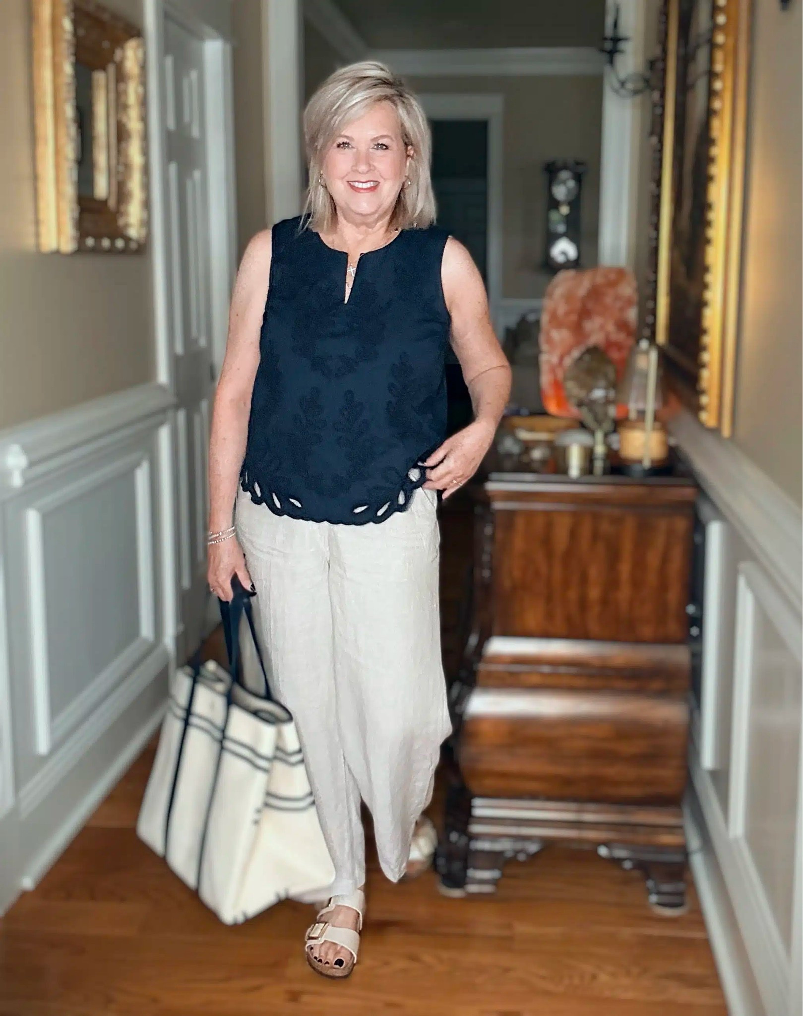 Navy eyelet top and linen pants for an everyday Summer outfit! This look can work for the office, vacation or a day shopping. I’m wearing a medium tank and wide leg pants.

#LTKootd #LTKOver40 #LTKWorkwear