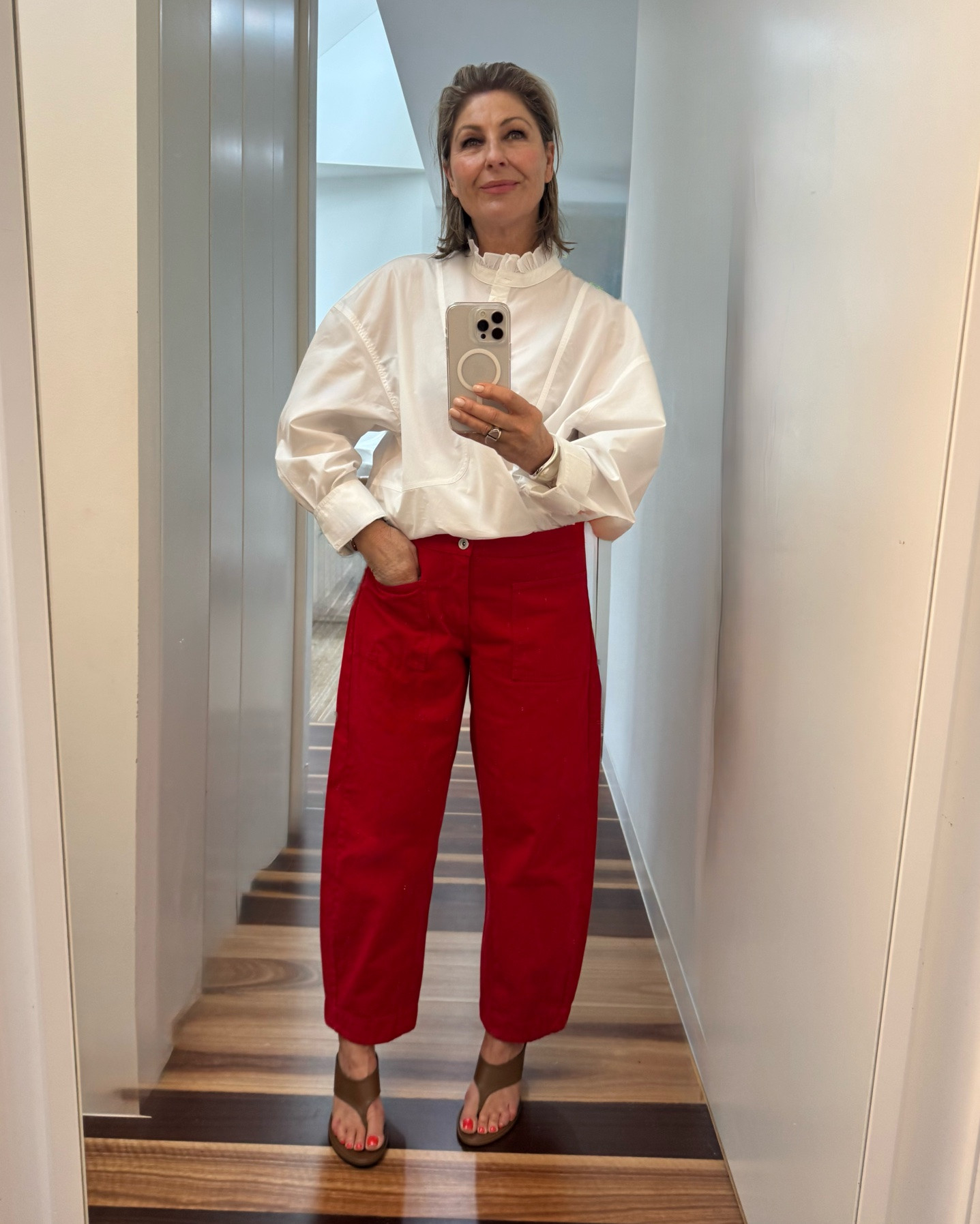Your new white shirt is updated : it’s now collarless with a little frill detail. Big sleeves & voluminous cut. 
The barrel jeans ? Updated to red. 
Of course ! Love !
Add a camel blazer,  brown heels & choc bag : done. 
I’m wearing a size large in the shirt 
(it’s big , go down a size & it’s long too)
Wearing size 40 in the jeans . 
Shop it all here !

#LTKaustralia #LTKover50style #LTKstyletip