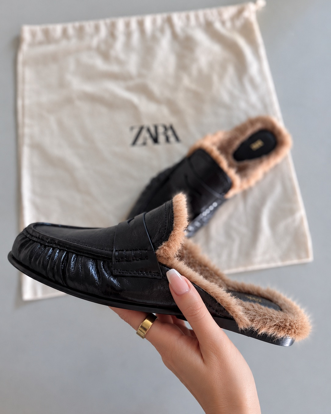 The fur-lined mule is having its moment, & I’m here for it. My classic Gucci Princeton loafers will always have a place in my closet, but these new penny loafer mules from Zara are such a good find. Two takes on a timeless fall staple.

Fur lined mules - Gucci Princetown loafers - Zara loafers - Penny loafer mules - Fall shoe trends - Fall 2026 fashion - Designer shoes - Luxury style - Elevated everyday style - Cozy fall shoes - Classic loafers - Effortless chic - Fall wardrobe essentials