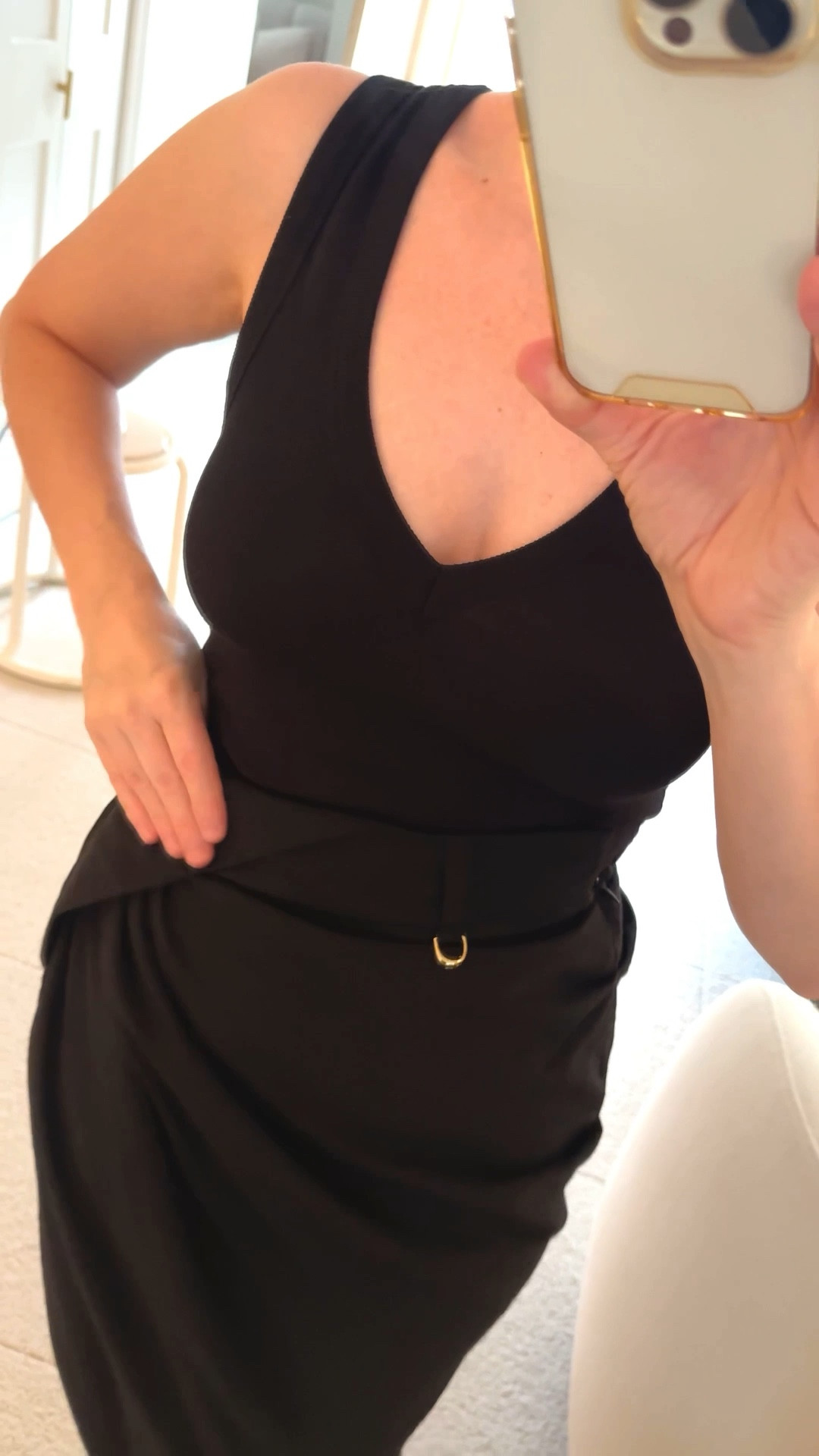 my favorite black tank for the season is this v-neck from me+em. it pairs perfectly with this jacquemus midi side slit skirt.

the details make it look like a pair of pants folded down. comfy light material in black. (it also comes in navy and white but i liked the black best, it also comes in a mini version)

it's a little snug, i got the size 32 but i'm not worried about it.

for reference i am 5' 1" and a size xs /0

#LTKPetite #LTKOver40
