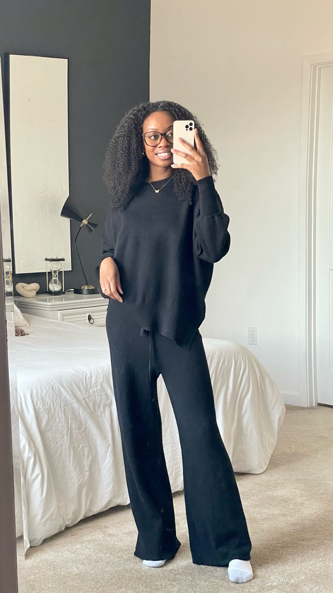 This two piece set is great quality and super comfortable! Perfect for the coming winter to lounge around the house in style. 

I’m wearing a size medium but I could definitely stick with my revalue size small. It also comes in several different colors! 

Knit sweater set, two piece set, amazon find, wide leg sweatpants, black outfit, winter outfit, casual outfit, everyday outfit

#LTKfindsunder100 #LTKGiftGuide #LTKstyletip