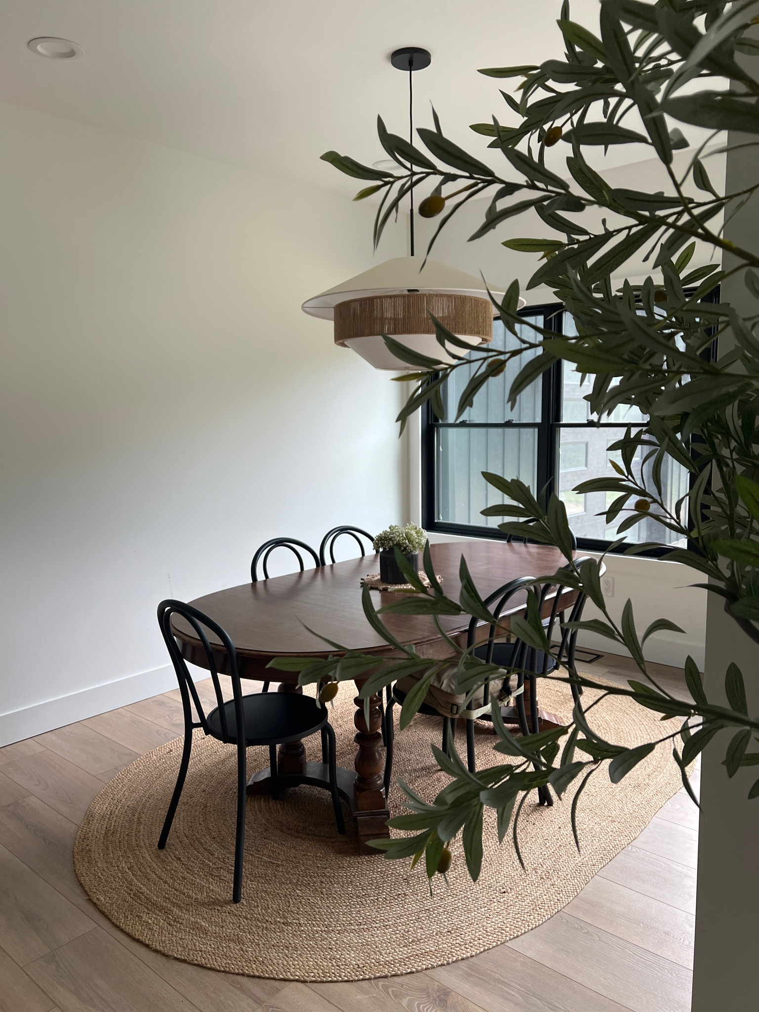 This is the “viral” Costco tree, about $379 (I think) in store!
Table was bought at auction.
Chairs are outdoor patio bistro chairs from At Home a few years back  

#LTKHome #LTKFamily
