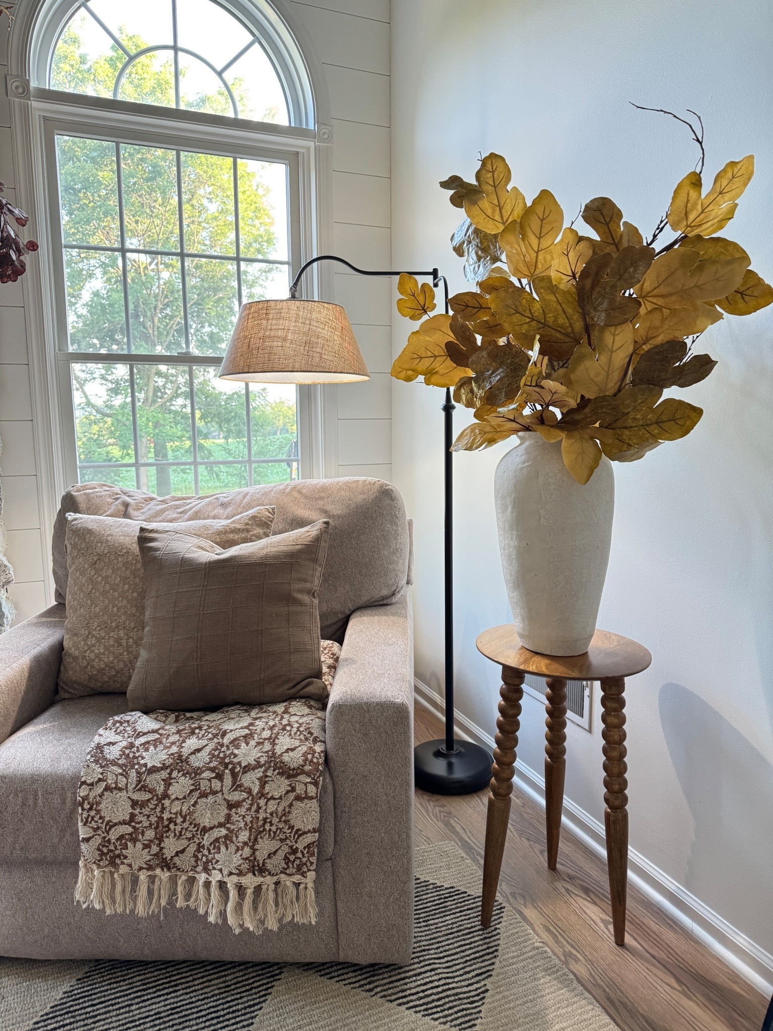 Shop my favorite corner: my best selling curved floor lamp with linen shade currently on sale, solid wood accent table, the 47” viral fig leaf stems that come in a pack of six (I have 3 in this vase,) similar large white vase, brown and cream floral throw and throw pillow covers and inserts  

#LTKSaleAlert #LTKHome #LTKStyleTip