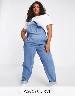 ASOS DESIGN Curve 'original' denim overalls in midwashwindow.asos.performance.markAndMeasure(`pdp... | ASOS (Global)