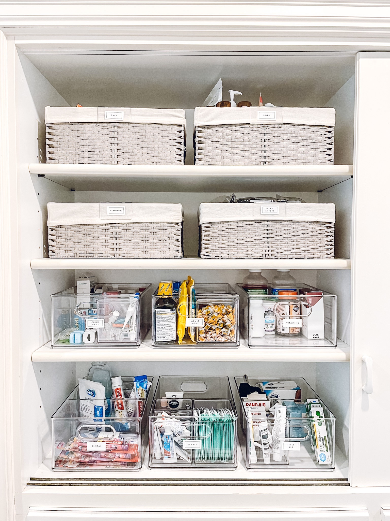 Linen closet organization. Home Edit Tall Bin Organizer and Divided All-Purpose Bin. The Container Store Montauk Bin✨

#LTKkids #LTKhome #LTKfamily