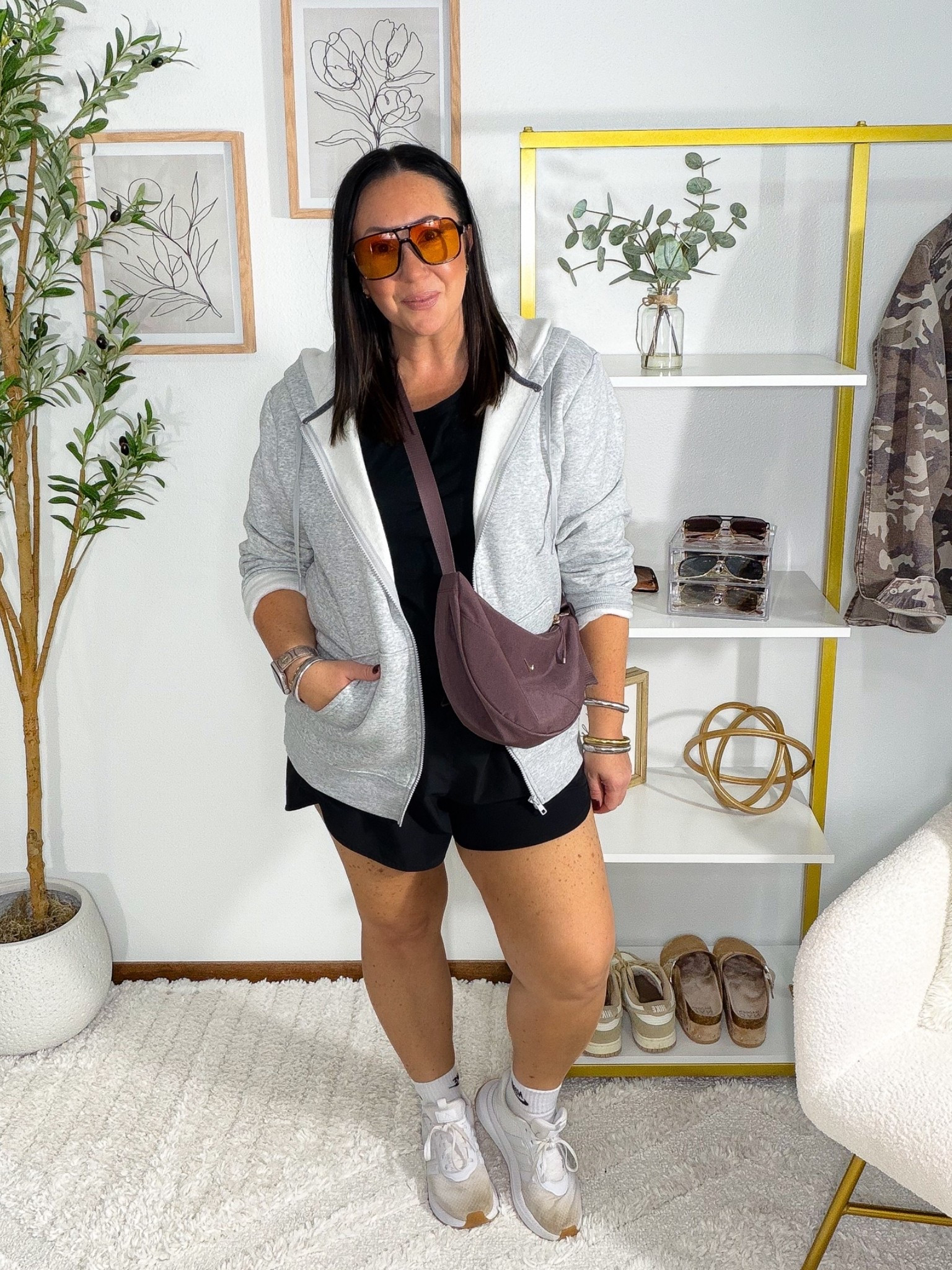 I found us the best oversized fleece full zip hoodie in the men’s section at Walmart! And it’s just under $15! Wearing a large. XL gap 100% cotton tee. XL target woven running shorts. Nike socks from Amazon. Adidas shoes from Amazon. They run true to size. My new favorite casual crescent style bag by Nike!

#LTKmomlife #LTKMidsize #LTKActive