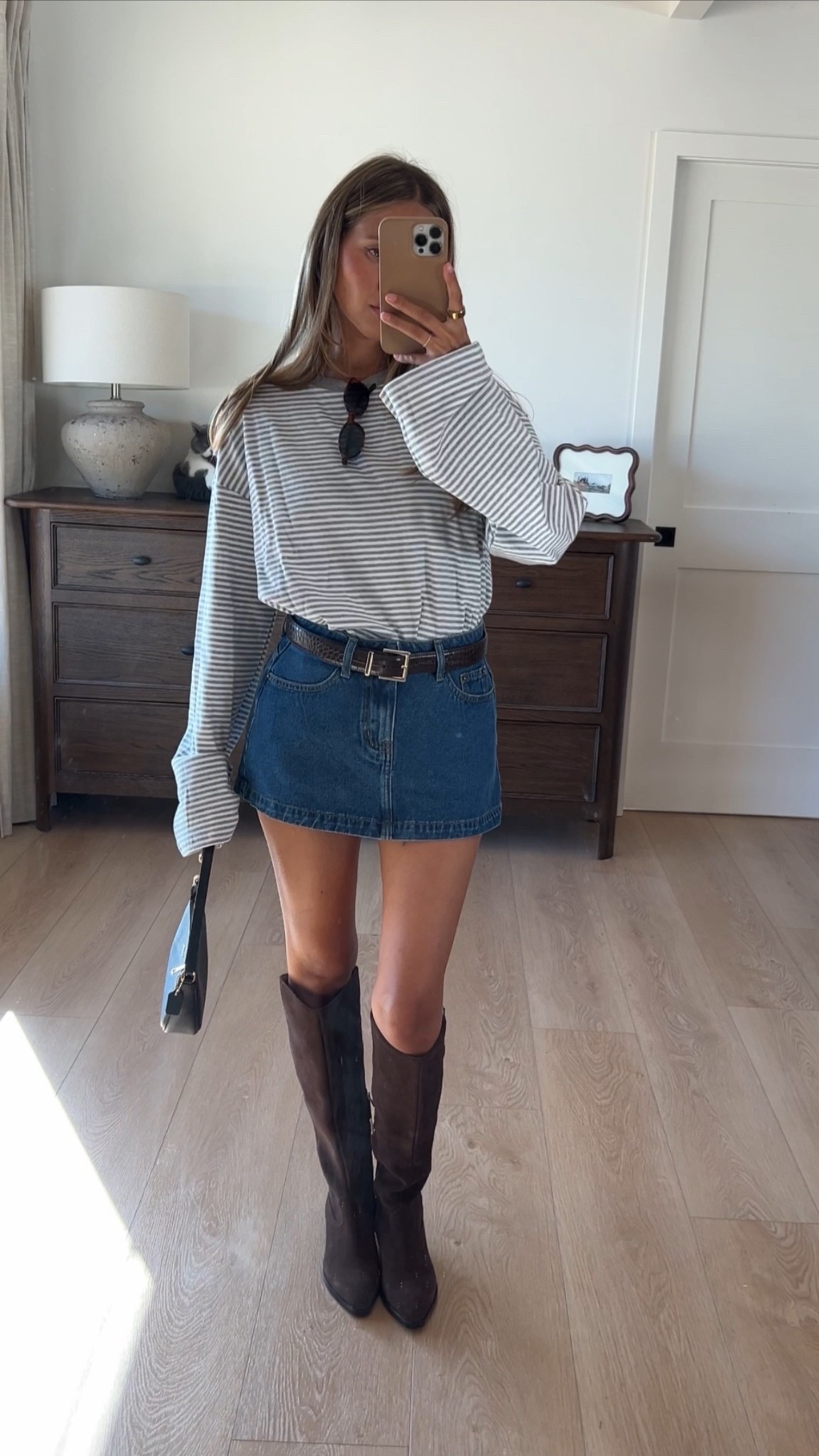 WHAT I’M WEARING🤍
Top- TTS 
denim mini- def size up! 
Boots- TTS
Belt- sold out so linking similar! Everything else is below 🤍