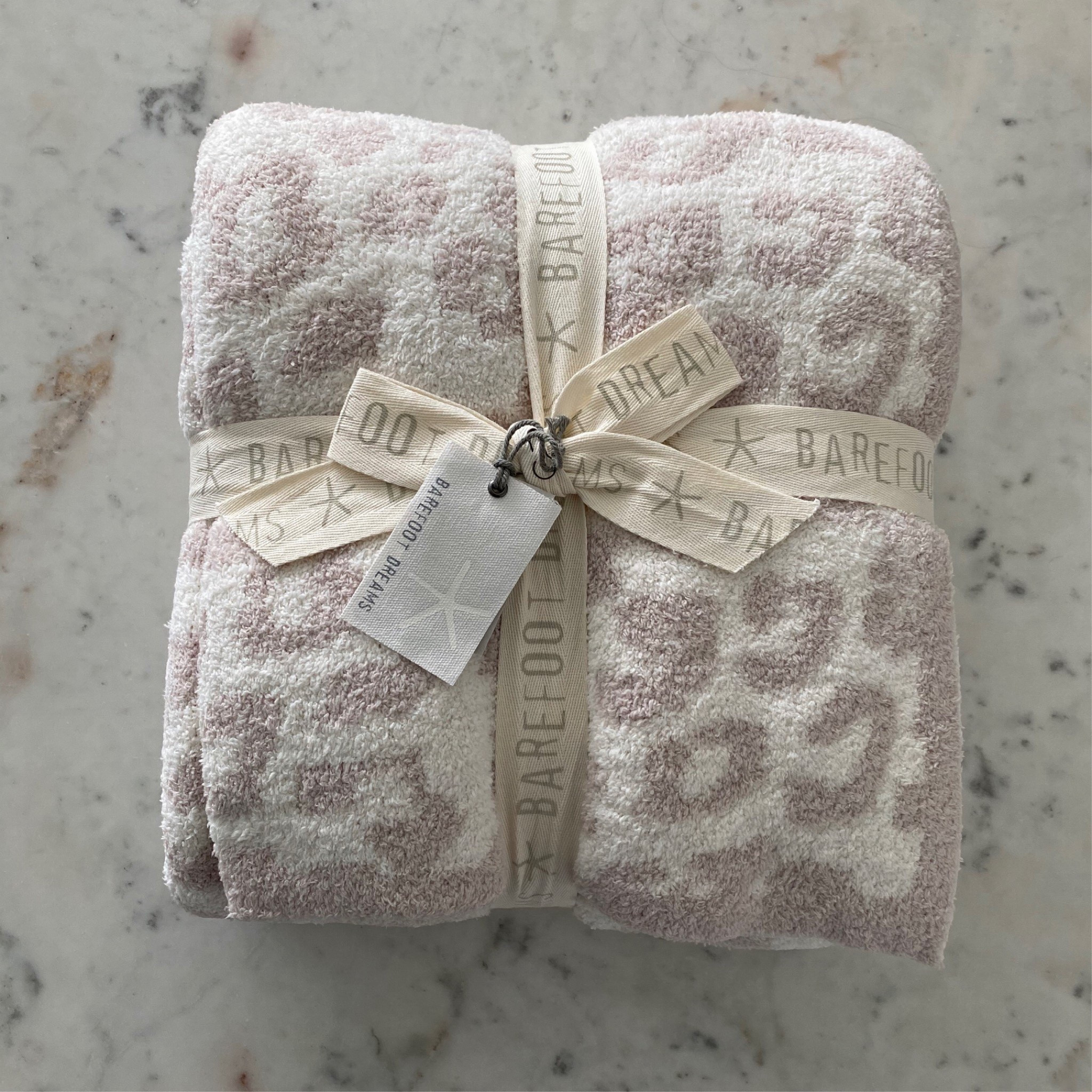 Barefoot dreams throw now $41 originally $170