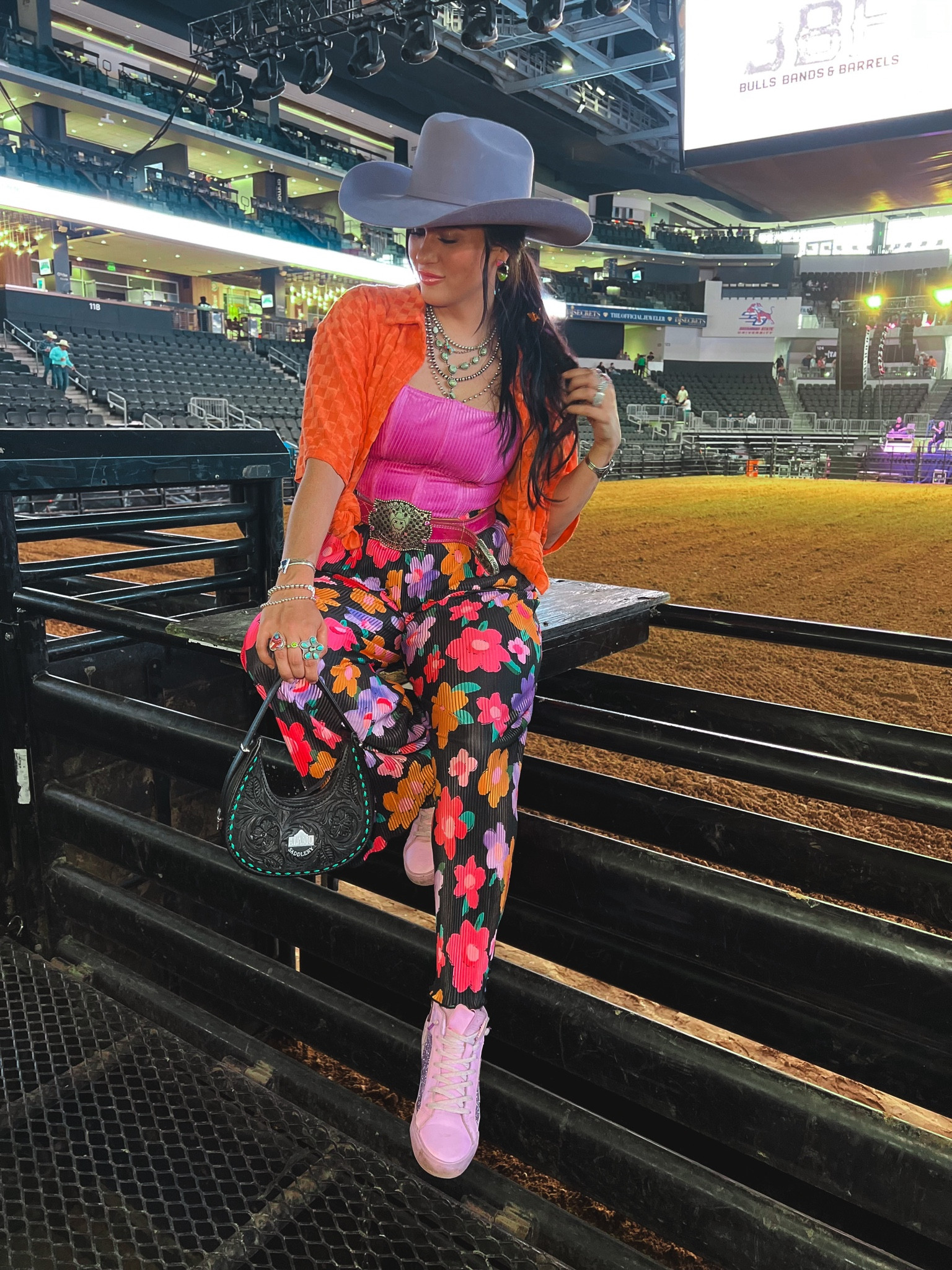 Orange top from Big Brat Boutique  

Cowgirl outfit. Neon cowgirl.
Country concert outfit.
Colorful cowgirl outfit.
Cowgirl hat. Butterfly hair clips. Hair clip hairstyles.
Spring style outfits

#LTKstyletip #LTKSeasonal #LTKFestival