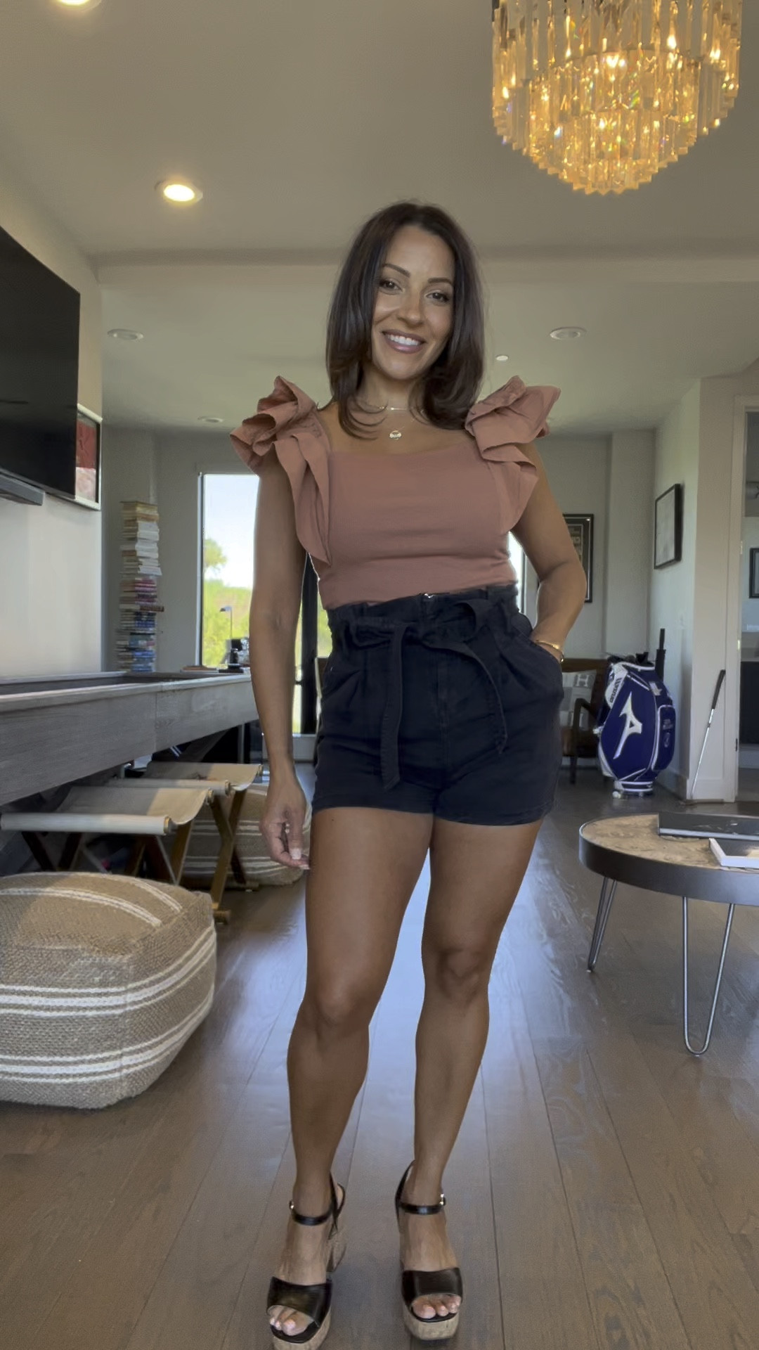 Casual yet feminine and classy in these high-waisted black shorts and clay-colored top. I'm loving these flutter sleeves! 
Paperbag shorts, bronze top, fun top

#LTKSeasonal #LTKstyletip #LTKitbag