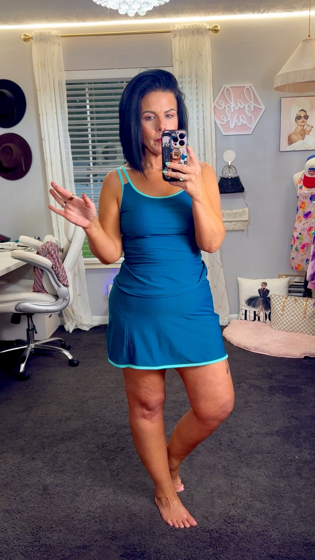 Is it a swimsuit or a tennis outfit? 

Tankini Two Piece Bathing Suits Tummy Control Ruched Swim Suits with Skirt
Wearing Medium- I size up 1 in all my bathing suits 
5’ 1“
140 pounds. 

#LTKSwim #LTKOver40 #LTKMidsize