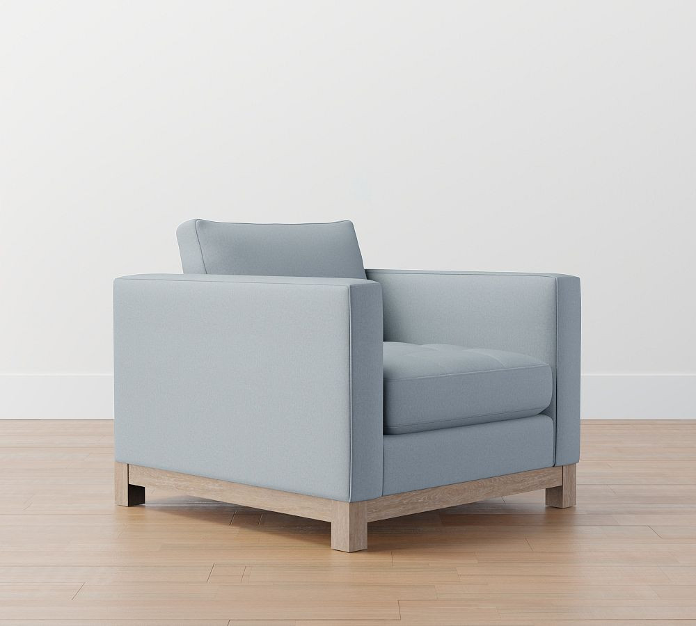 Jake Upholstered Tufted Armchair with Wood Legs, Polyester Wrapped Cushions, Performance Brushed Heathered Weave Chambray | Pottery Barn (US)