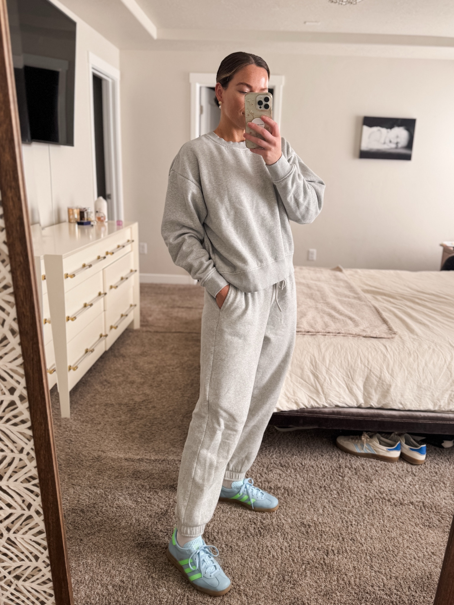 I sized up in the sweatshirt & sweats for a cozier look & feel. The jogger sweat style is out of stock, but they have them in the wide leg which I think is SO cute! And the sweatshirt is on sale!
Also, I size down 1/2 size from my regular shoe size for these adidas. 

#LTKFindsUnder100 #LTKSaleAlert #LTKShoeCrush