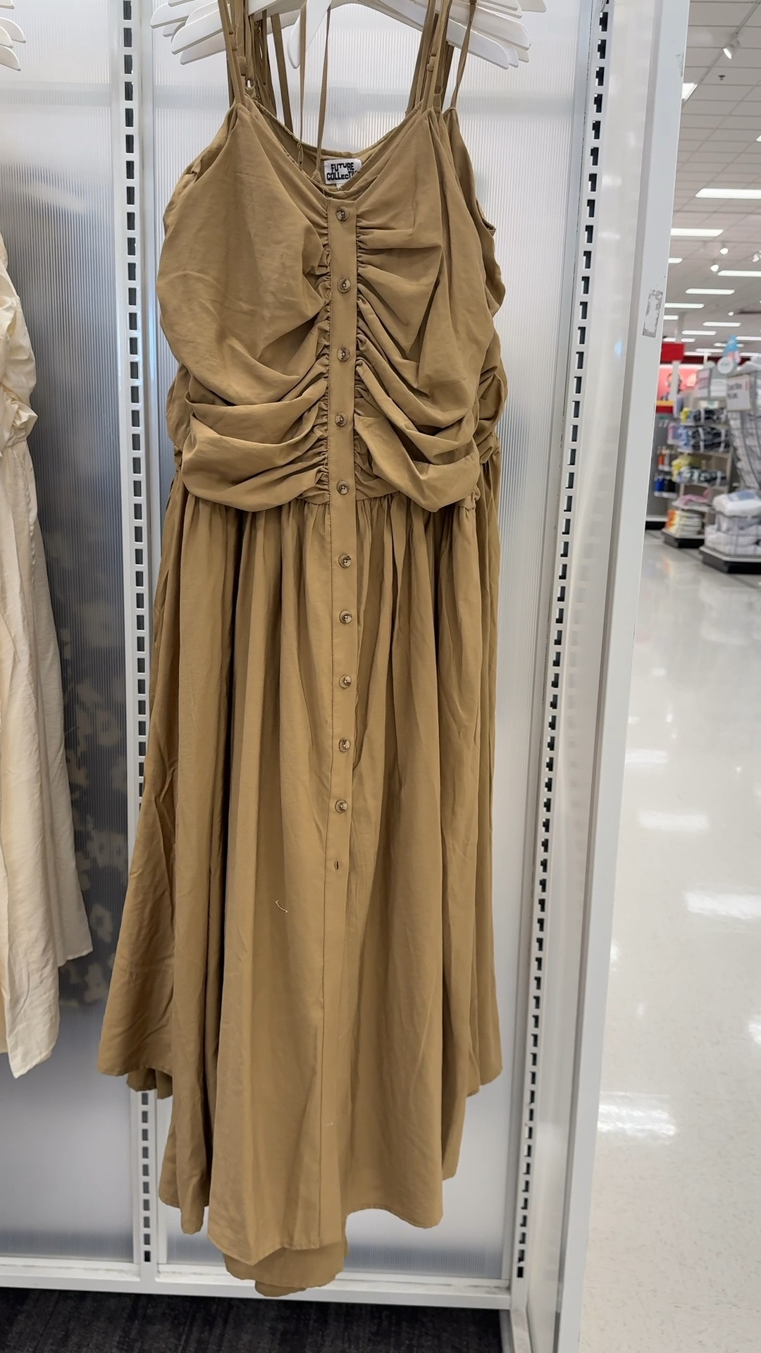 Ruched midi tank dress in kahki
Target 
Transitional fall dress

#LTKSeasonal #LTKOver40 #LTKFindsUnder50