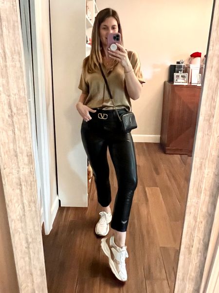 When you’re sporty but glam you pair a silk blouse with vegan leather pants and trainers … but make it fashion. 😉

Dress down your leather pants with a fashion sneaker for daytime wear. (This would be cute paired with a rocker tee too for an even more casual look!)

Blouse is size small. 
Pants are 29. (I sized up).
Sneakers are 11. (I sized up. Runs in whole sizes.)

#LTKStyleTip #LTKItBag #LTKShoeCrush