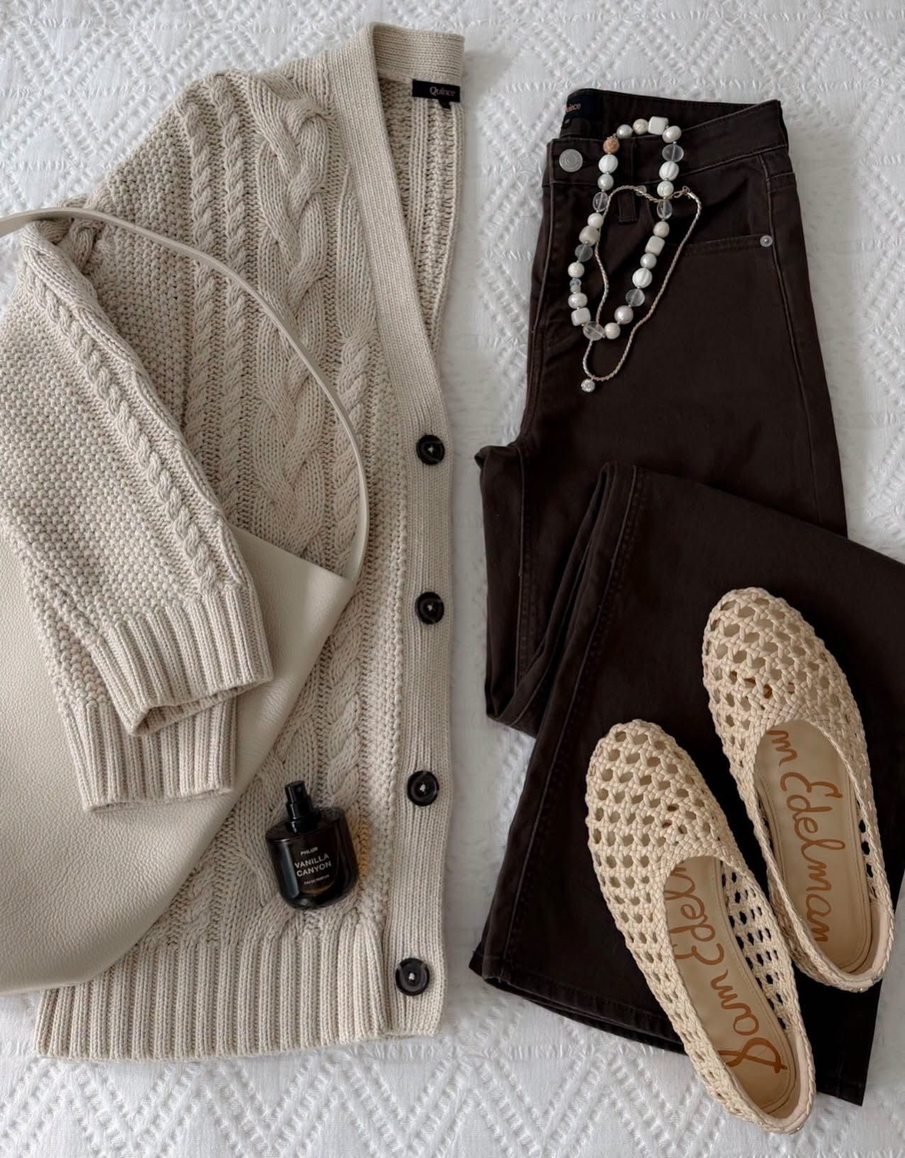 Chocolate brown denim with a chunky cable knit cardigan is such a good combination for early fall. I love the lighter accessories with it, especially the woven flats for those warmer days when you’re ready to start dressing for the season.

chocolate brown jeans, cable knit cardigan, fall denim, neutral fall outfit, woven flats, fall cardigan, transitional outfit, brown denim, casual fall outfit, fall fashion, annabrstyle

#LTKootd #LTKSeasonal #LTKOver40