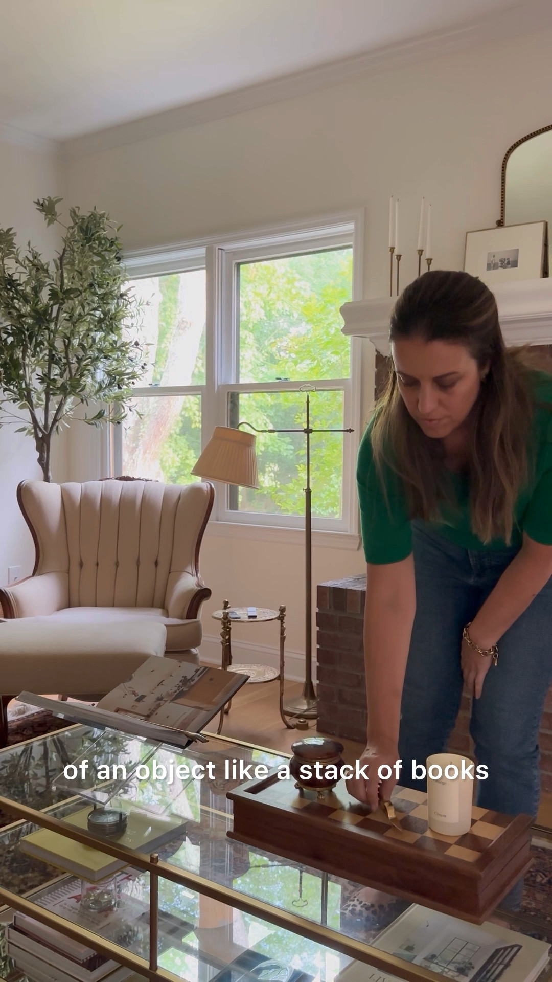 #coffeetable styling is one of my favorite things to do. For me it’s all about layering while mixing old with new. My tiered coffee table leaves lots of room for stacking design books, adding an open book display for extra visual interest, and placing a candle on top of a vintage chess board next to a set of vintage wick trimmers. #livingroom #home

#LTKHome #LTKVideo