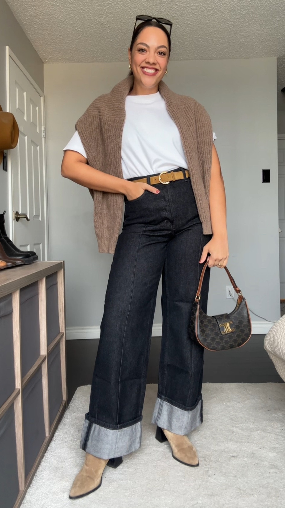 Ways to wear a crewneck sweater! Details below:

-Poppy Barley crewneck sweater in the colour dune. Made with 100% superfine lambswool. Super soft and versatile! I’m wearing a large. 
-Abercrombie plain white T-shirt, I have a medium. 
-Sézane tan suede belt. 
-Banana Republic rolled hem black jeans. I have a size 30 long. 
-Tan suede ankle boots, similar linked. 
-COS gold mini hoops. 
-Celine Triomphe 52mm sunglasses in black acetate. 


#LTKstyletip #LTKSeasonal #LTKfindsunder100